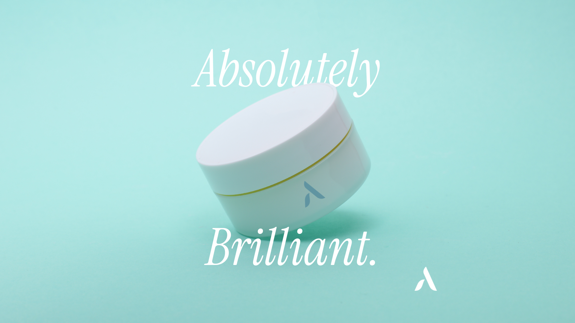A white cosmetic jar with a blue logo on a pastel turquoise background, with text that says 'Absolutely Brilliant.'