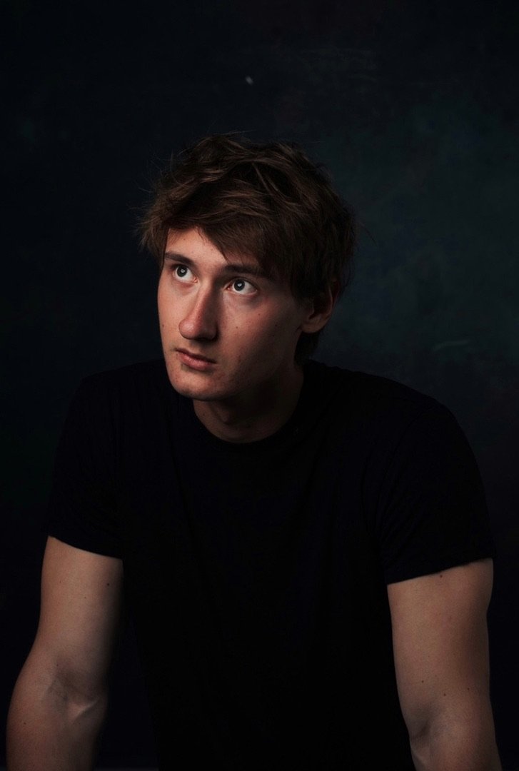 A dark artistic portrait of Oskar Fromm