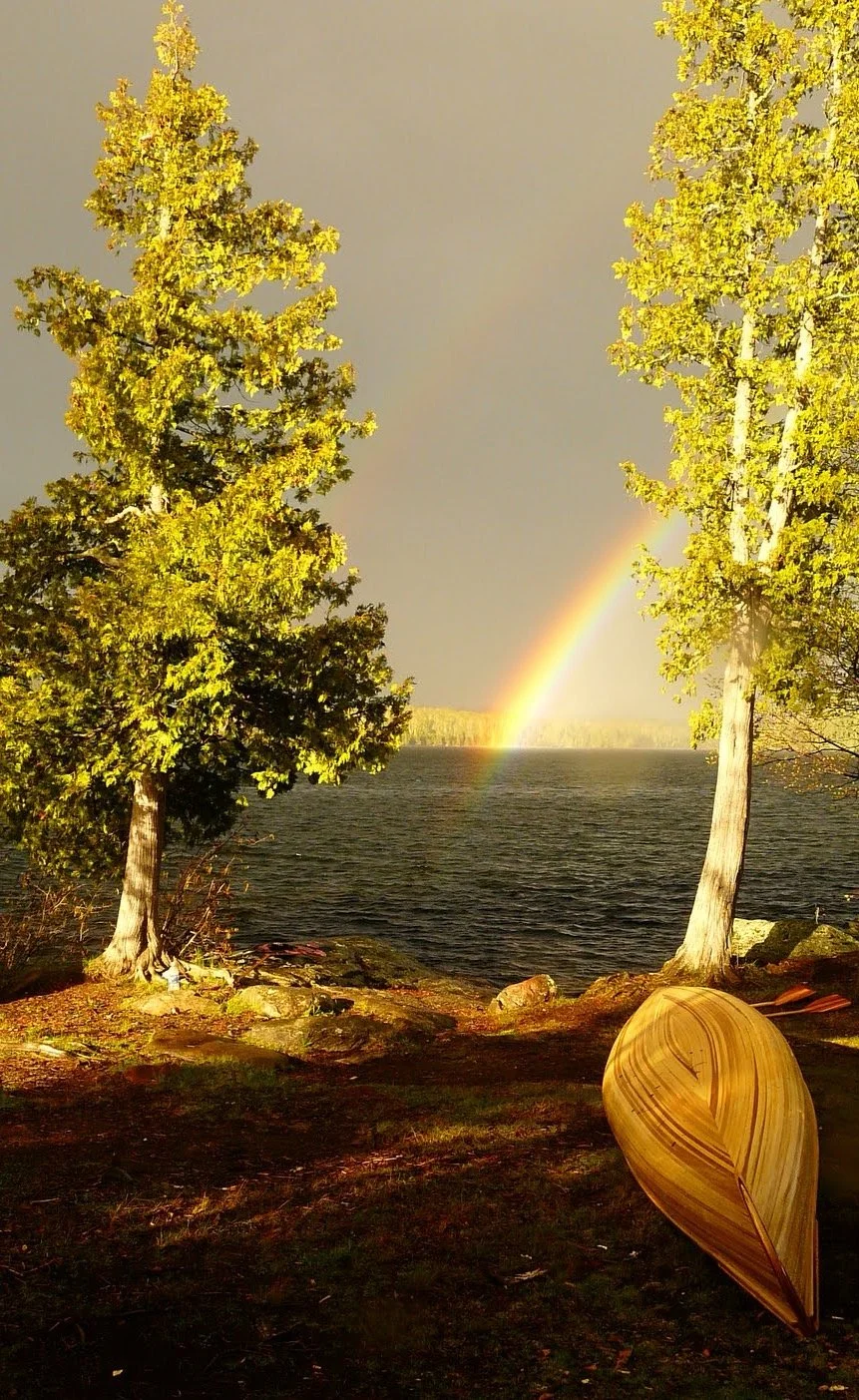 Handmade canoe and sunset on Brule Lake.