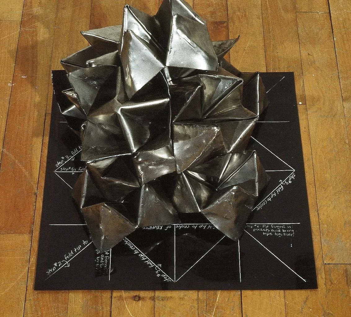 Multiple Choice: After. Folded steel, negative from blueprint. 2003.