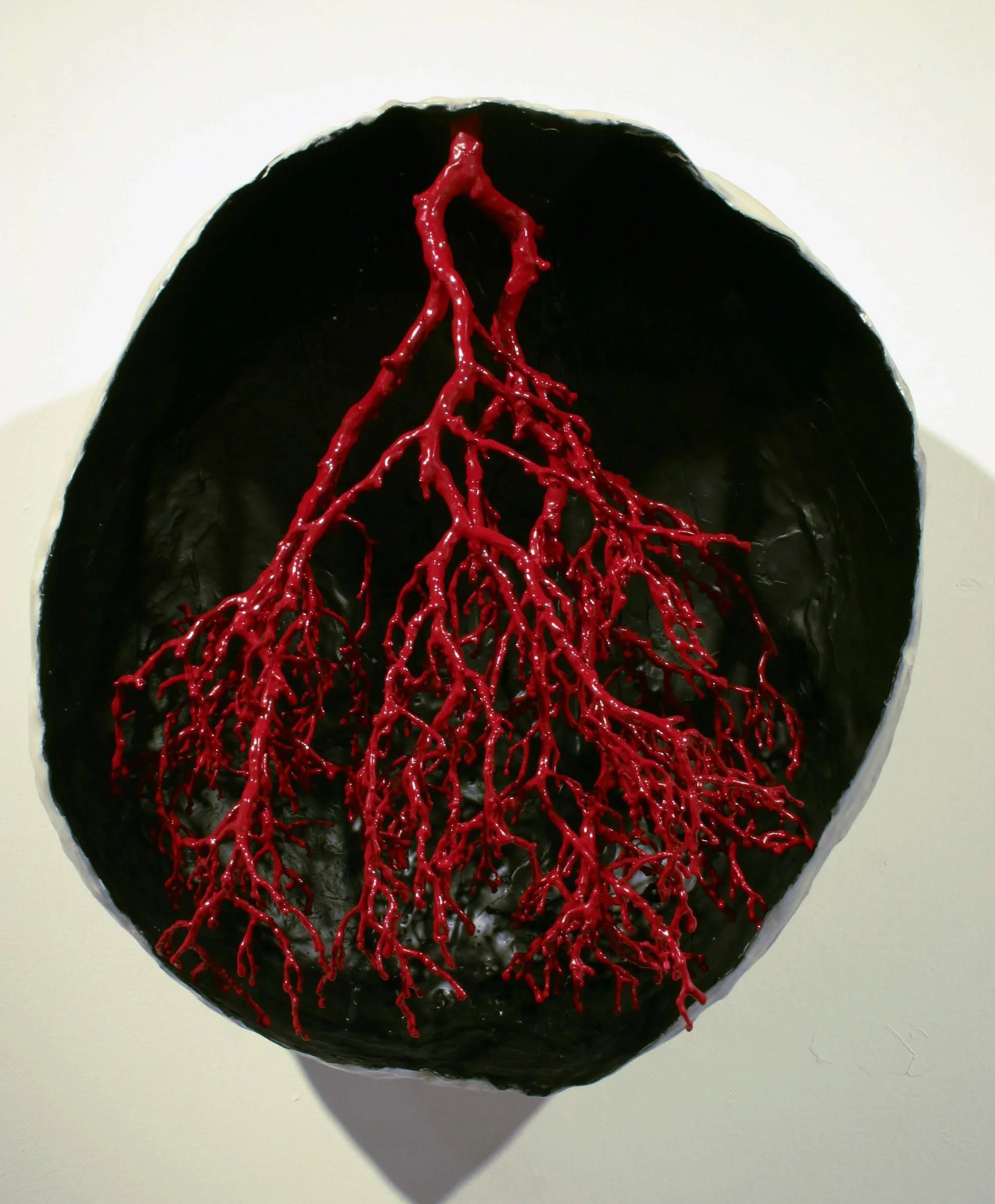 Nature or Nurture. Arbutus branch, wax, enamel spray paint.