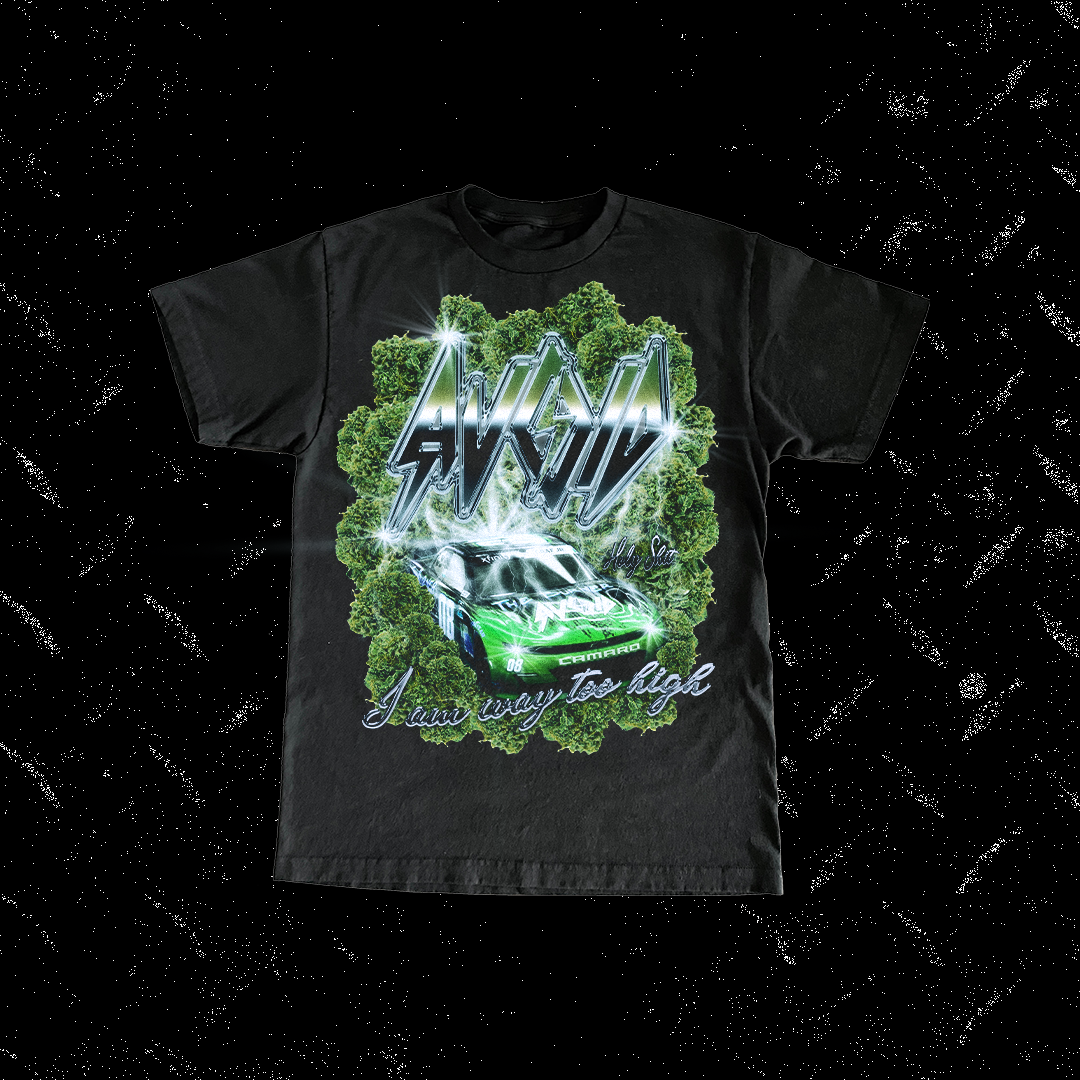 Black T-shirt with a neon-style graphic of a green race car and green foliage, with stylized text that reads 'AKWD' and phrases 'I am way too high' and 'dly Sia'.