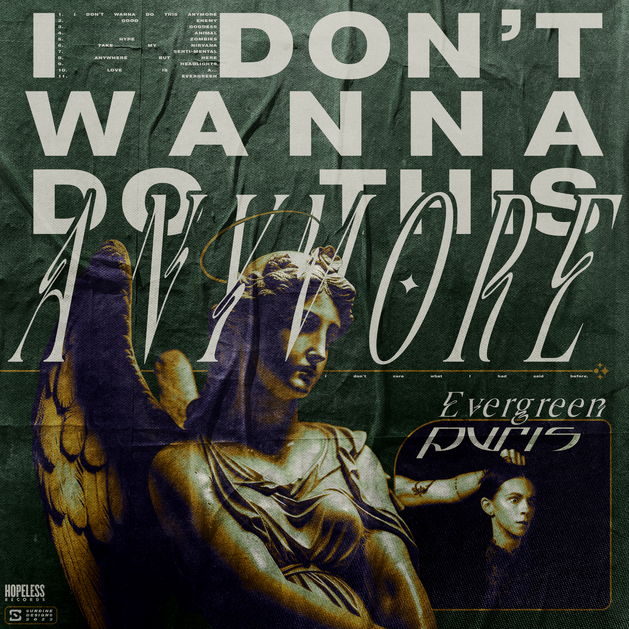 A poster with large text stating "DON'T WANNA DO THIS ANYMORE" at the top. Below, the word "LOVE" appears in smaller text. The main image features a sculpture of a woman with wings, potentially an angel, with a halo and contemplative expression. To t