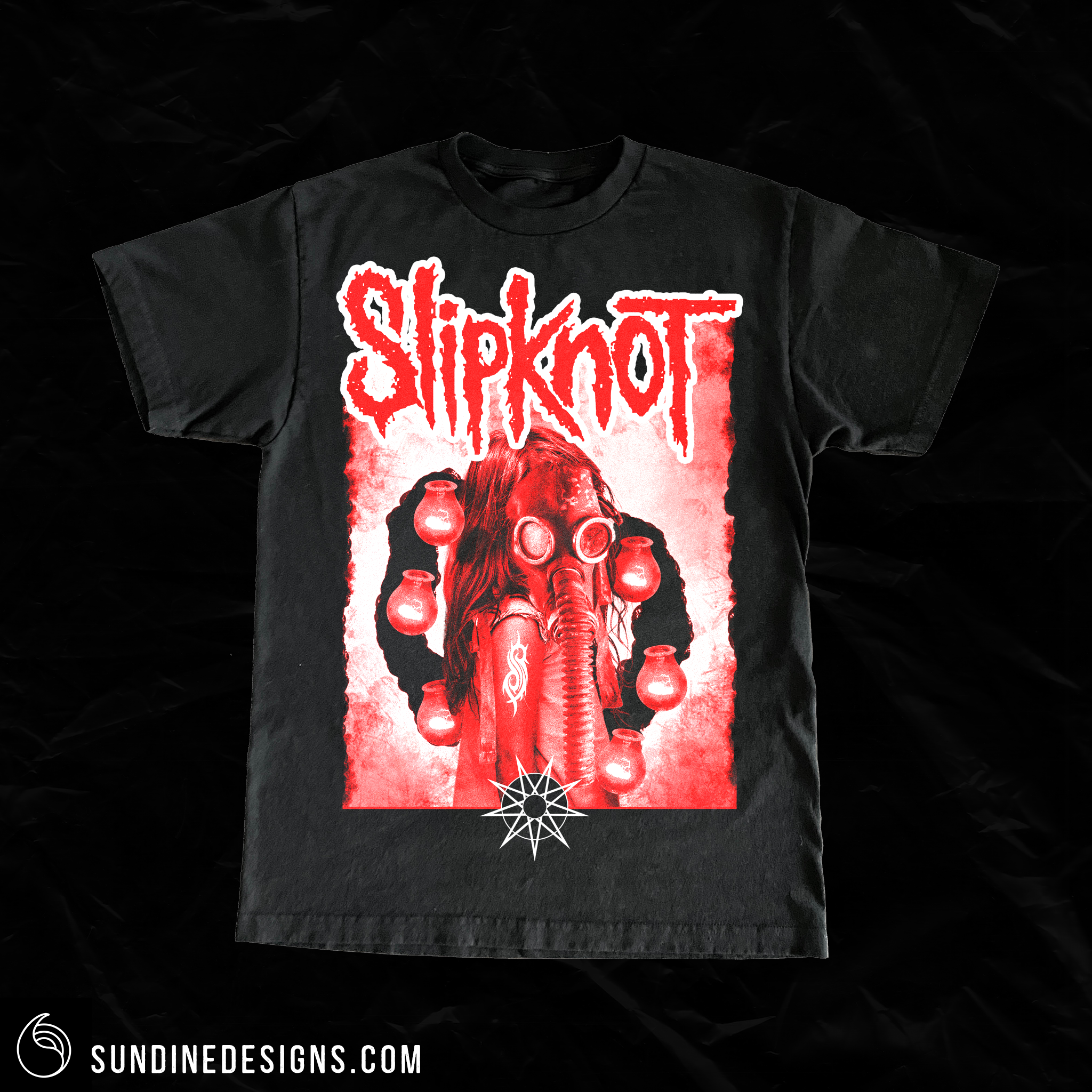 Black Slipknot band T-shirt featuring red and white graphic of a person with a gas mask surrounded by lanterns and a symbol below, with the band's name in bold red letters at the top.