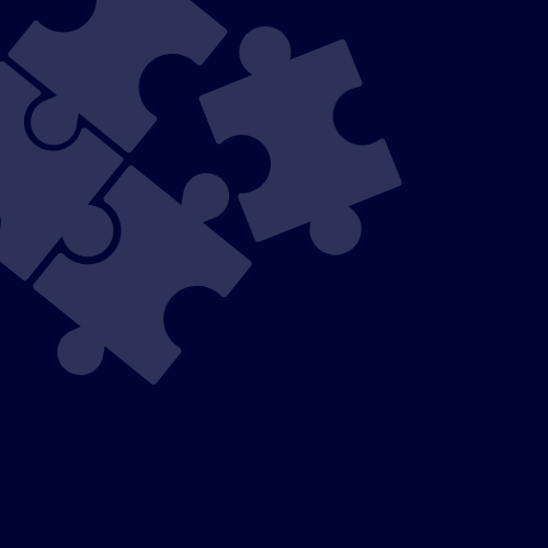 Silhouette of scattered jigsaw puzzle pieces on a dark background.