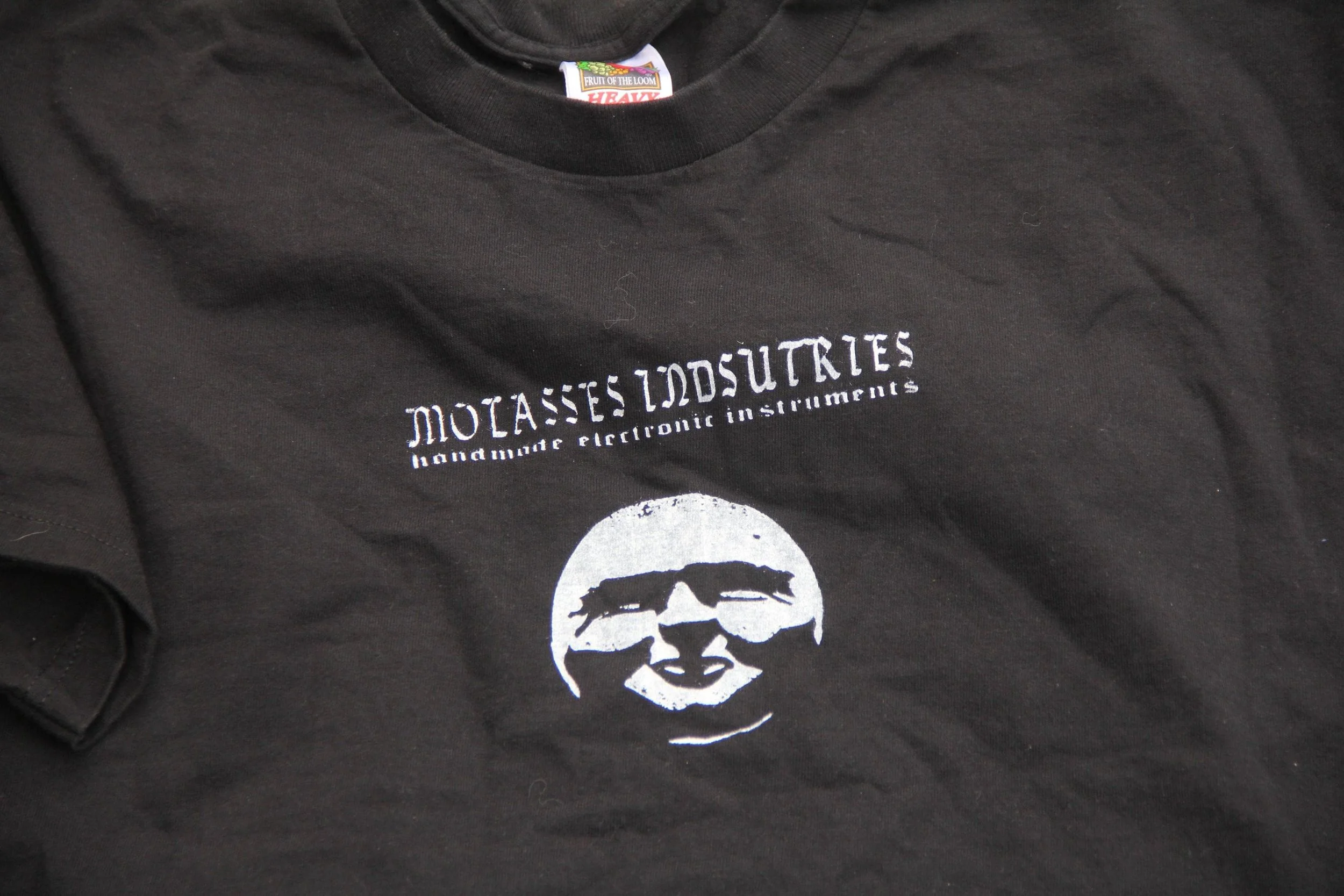 MOLASSES INDUSTRIES T SHIRT