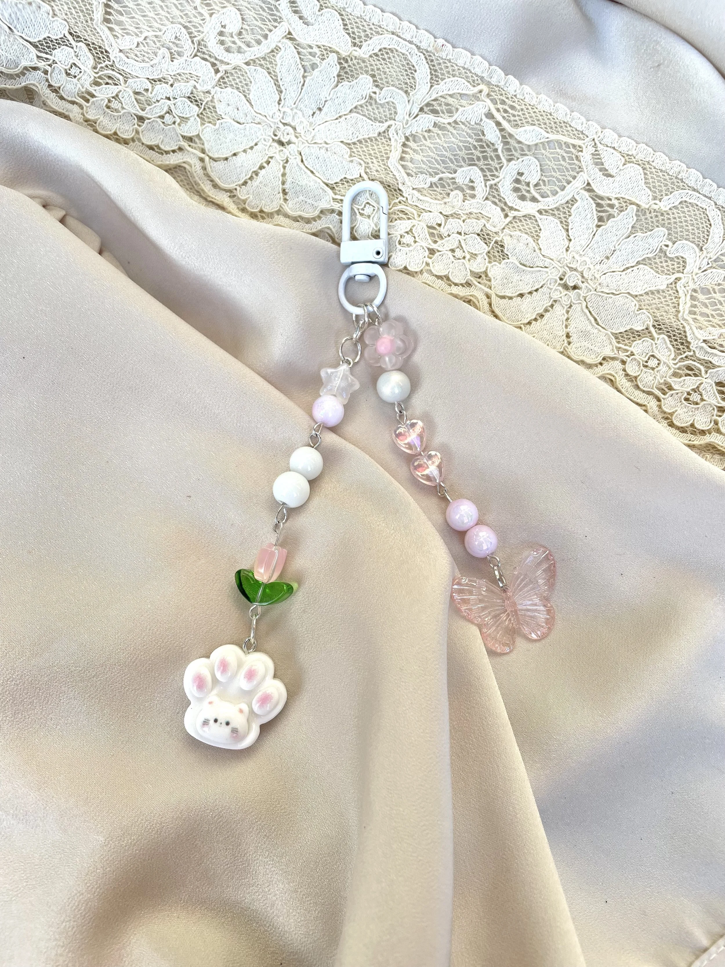 Llavero Rosa con una Huellita y Tulipán