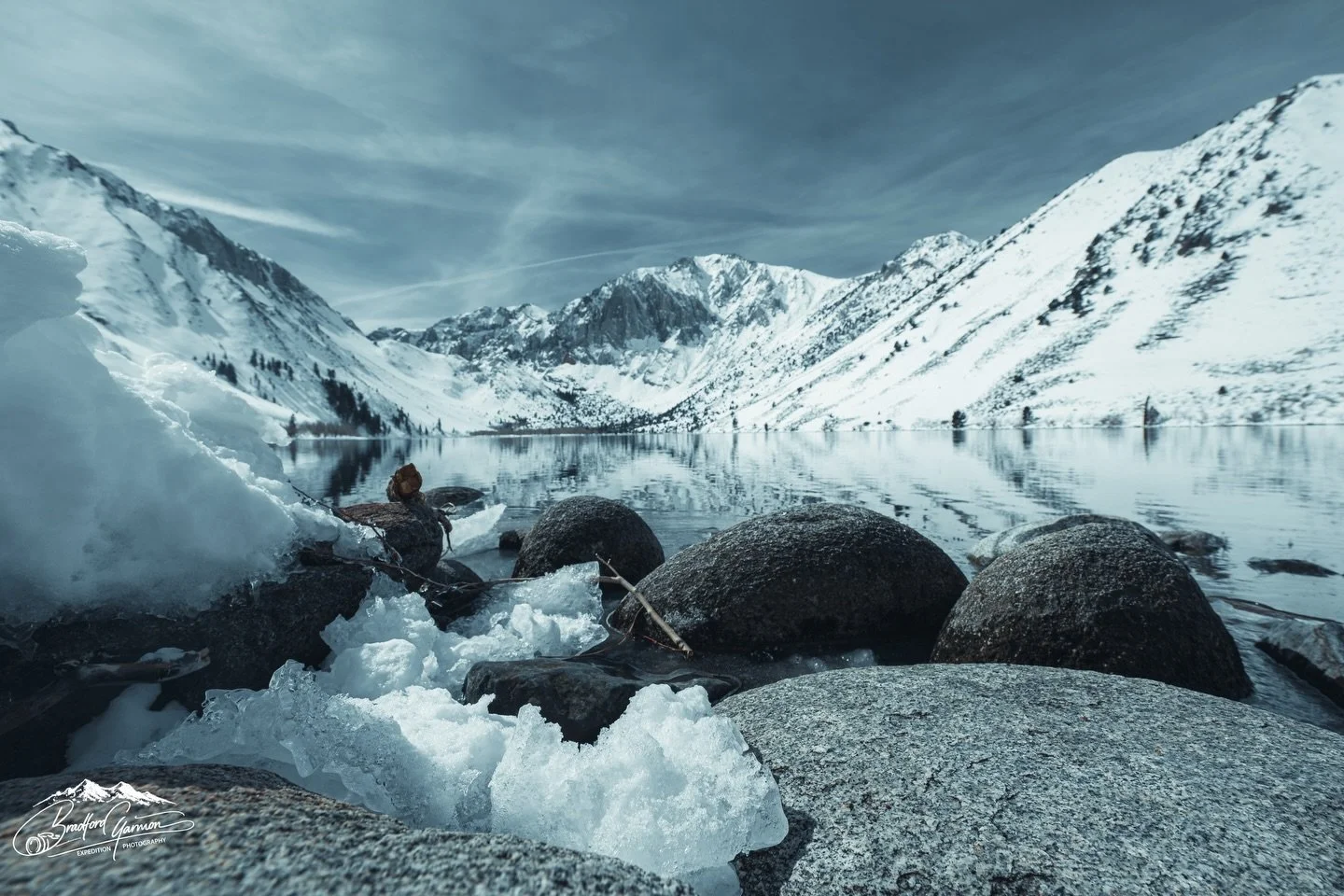 Convict Lake &mdash; Eastern Sierra, California

In 1871, a group of escaped convicts from Carson City fled into these mountains. A posse tracked them here, leading to a gunfight that gave this lake its name.

Today it&rsquo;s quiet. Frozen. Still.
H