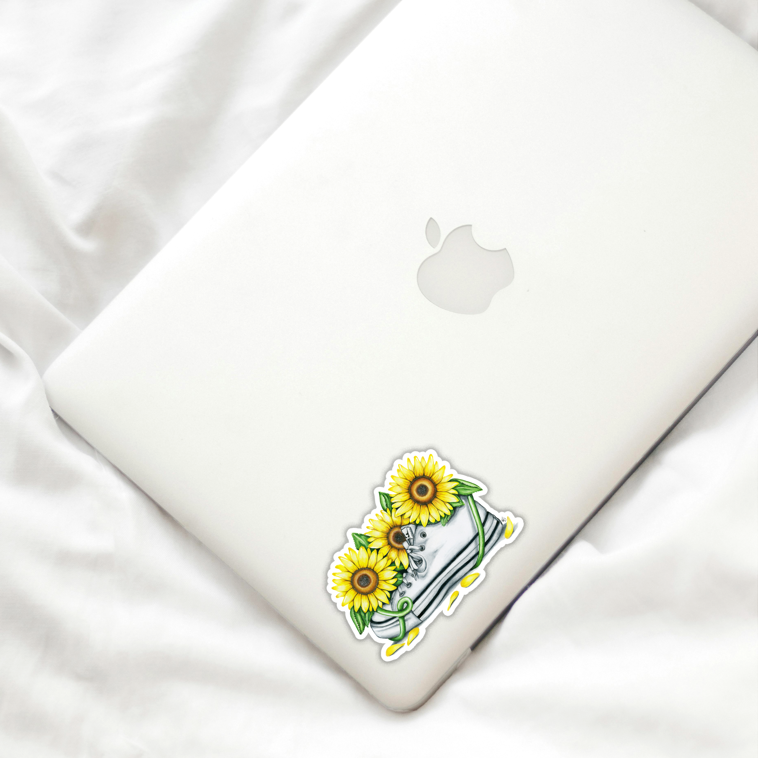 conv sunflower laptop.png