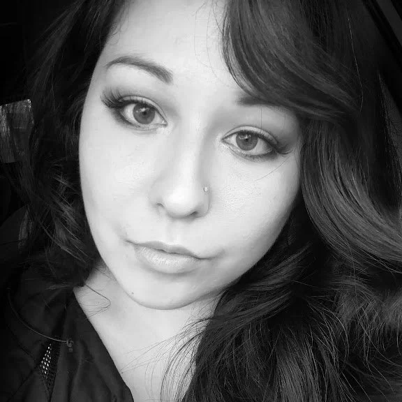 Black and white close-up of drivhn founder and primary mentor, Doria.