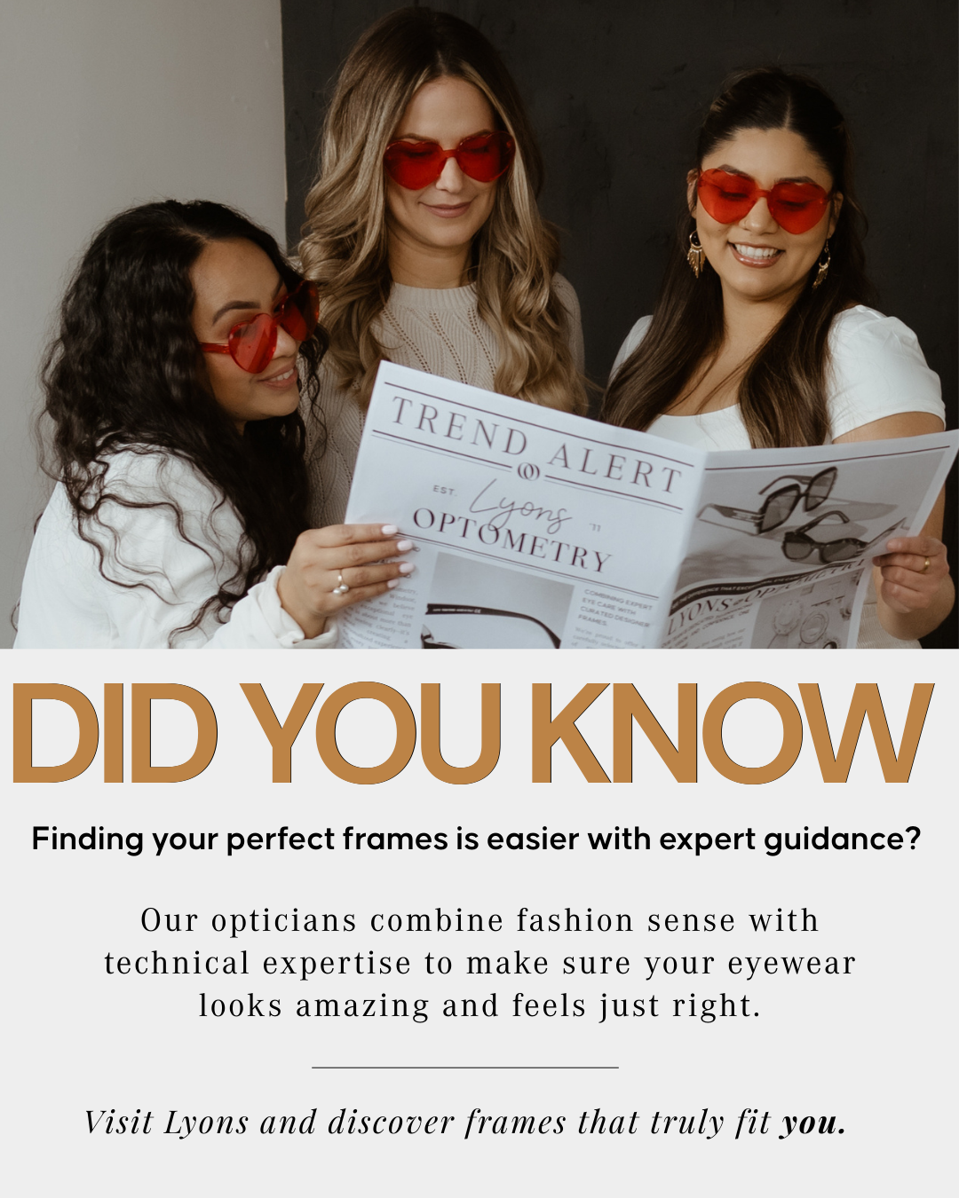 Three women wearing red sunglasses looking at a newspaper about eyewear, inside an optical store.