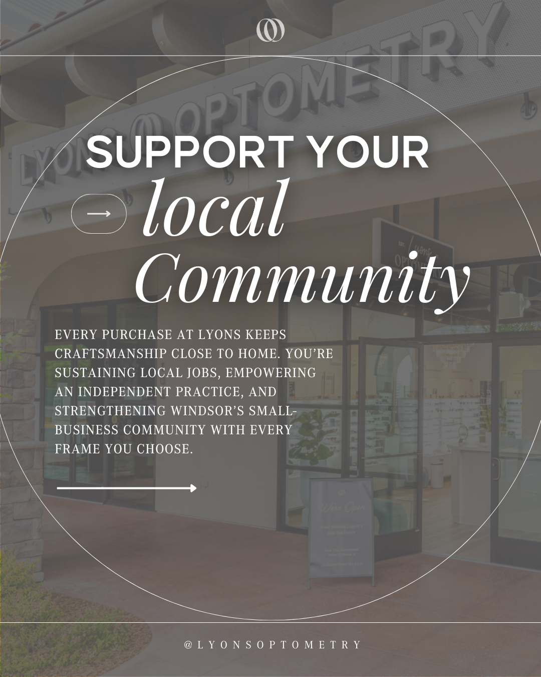 Sign for an optometry store outside a building with large glass windows.