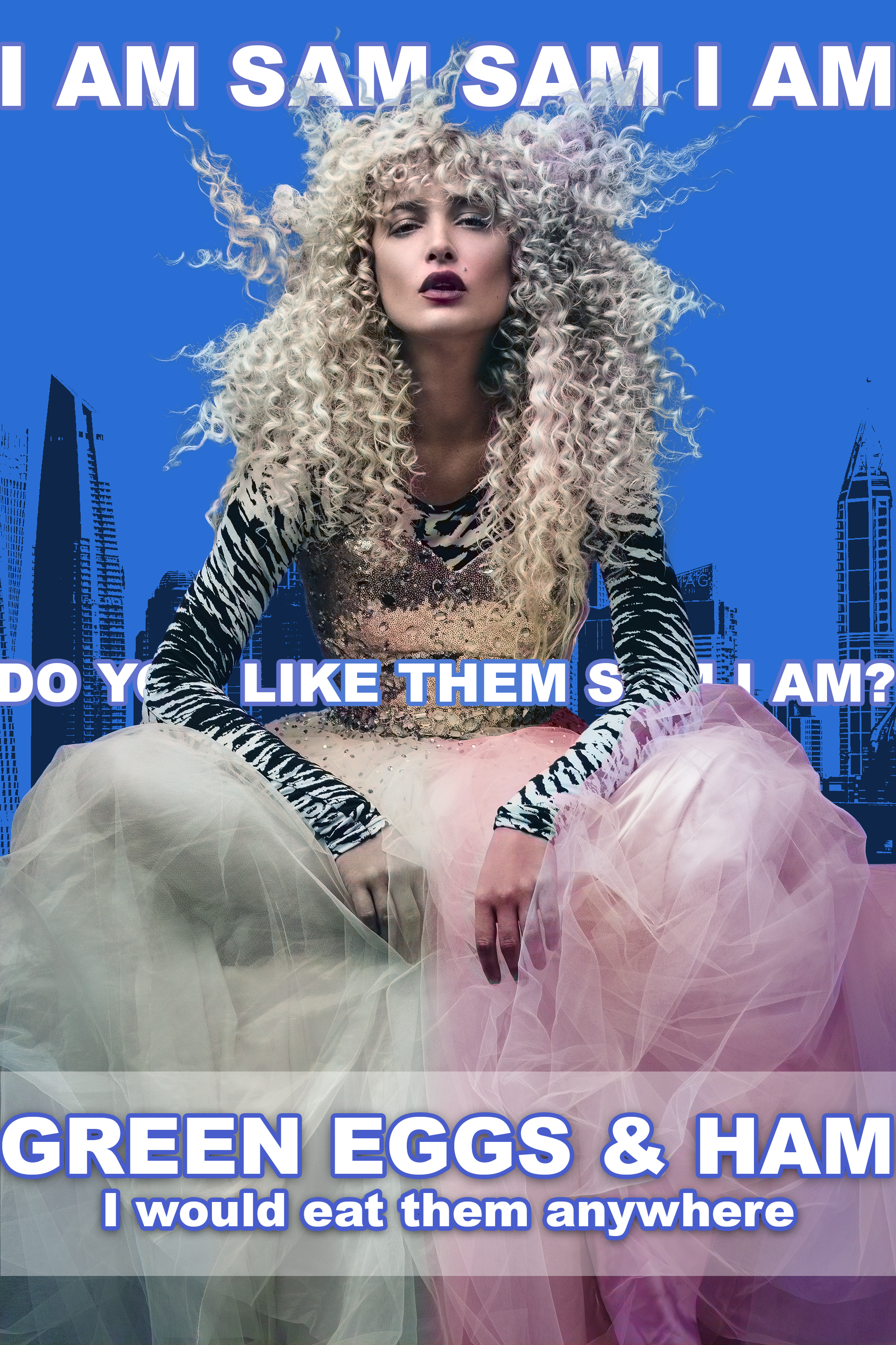 A woman with curly platinum blonde hair, dark lipstick, wearing a zebra-patterned top and a voluminous pastel-colored tulle skirt, seated against a blue cityscape background. The image contains overlaid text that reads: "I AM SAM SAM I AM" at the top