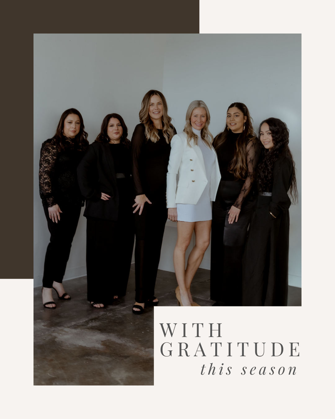 Group of six women in black and white outfits standing together indoors, with a text overlay saying 'With Gratitude this season'.