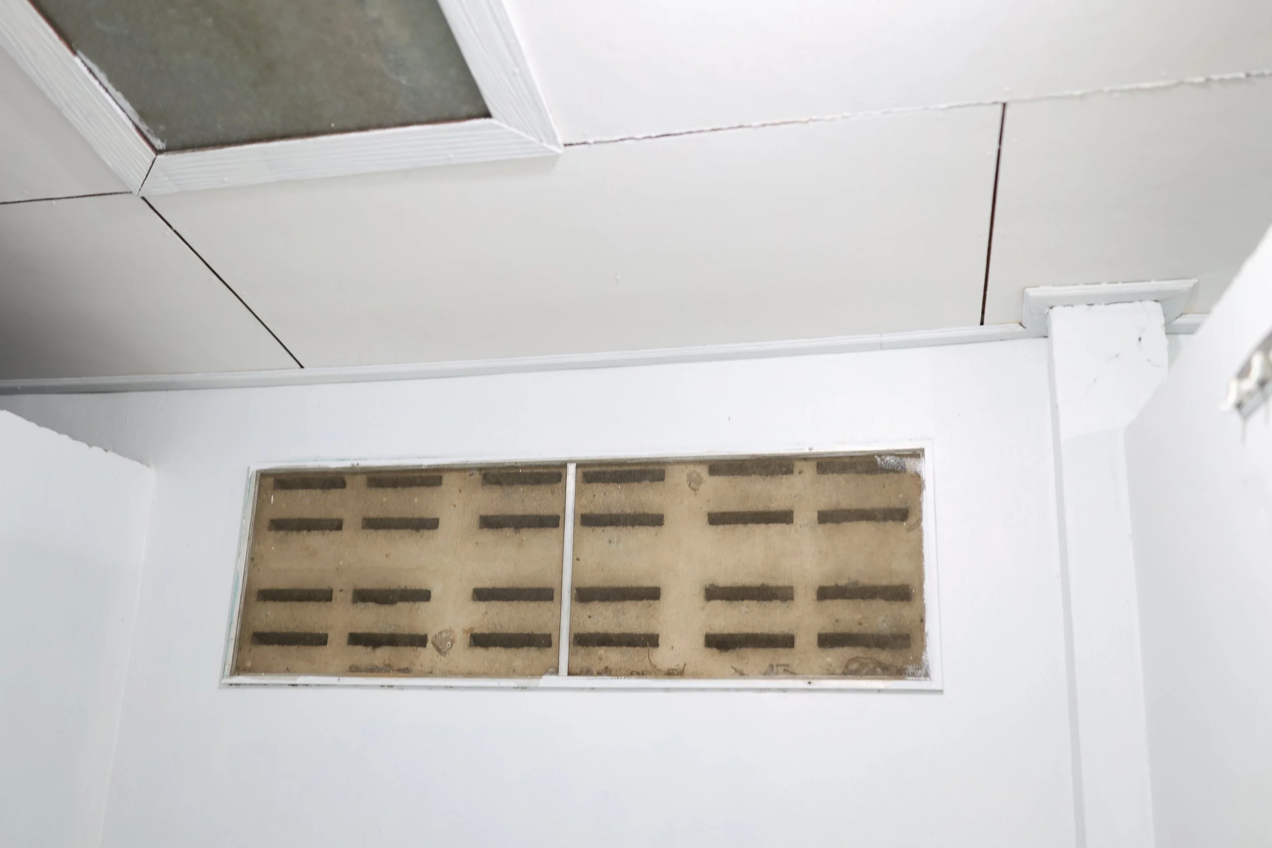 These window screens are intended to protect the girls from insects while allowing fresh air into the dorm. Over time, however, they collect large amounts of dust, mold, and insect debris. Despite repeated replacements, the screens quickly deteriorat