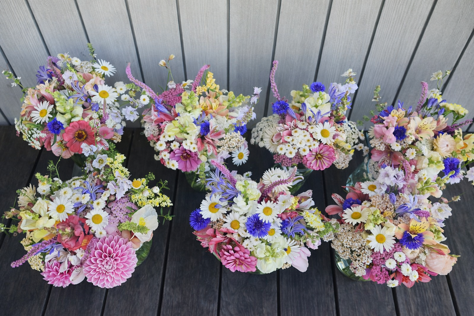 Bride and bridesmaid affordable flower bouquets, waiting for flower delivery in Te Awamutu.