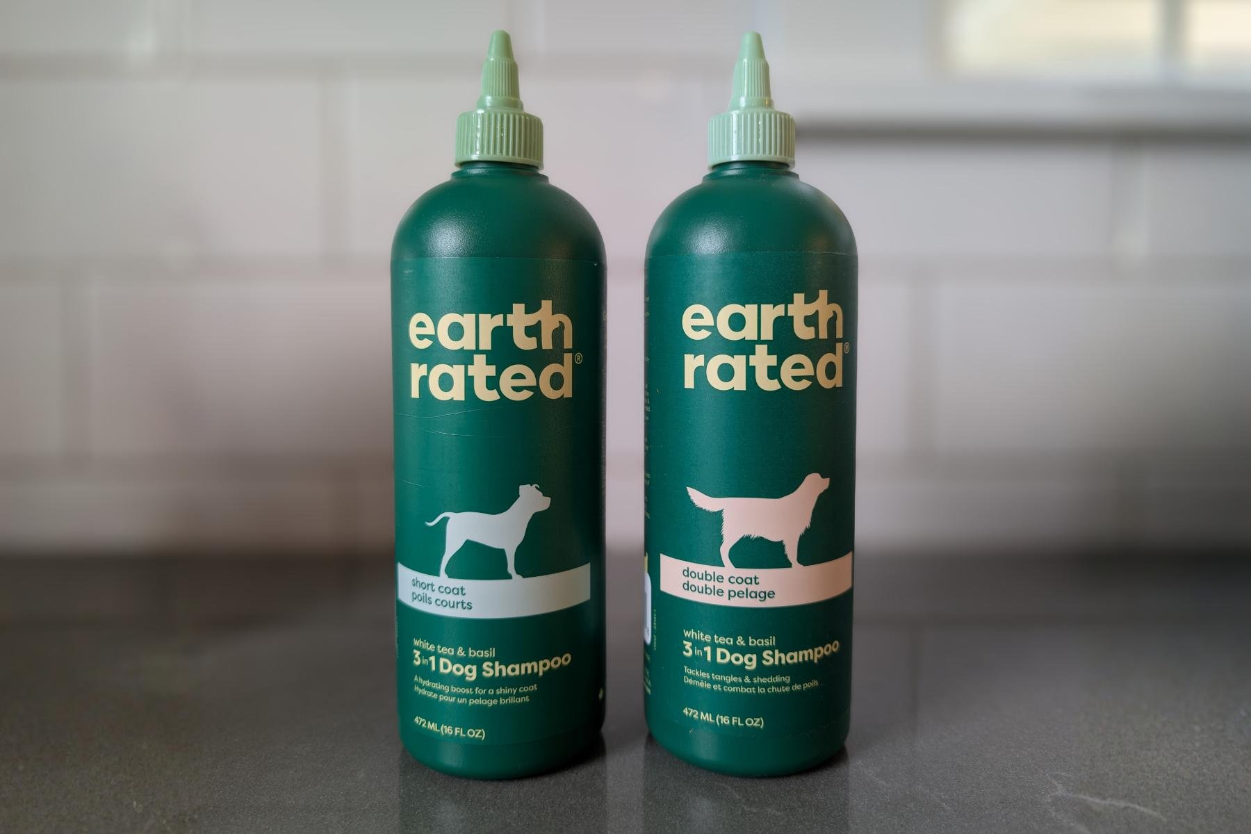 Earth Rated 3-in-1 short coat and double coat dog shampoo bottles side by side
