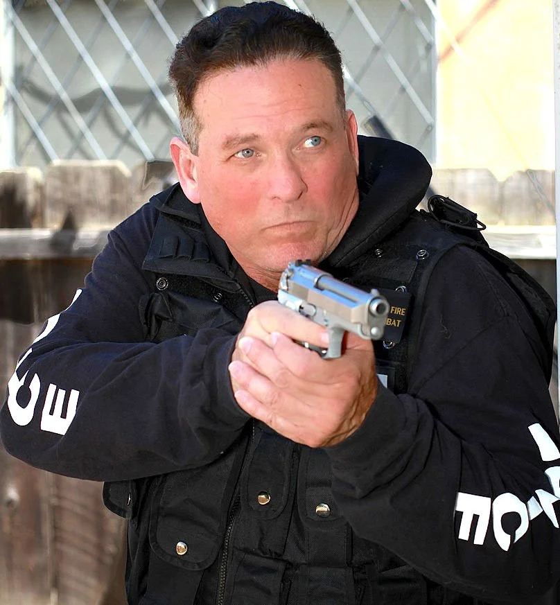 Anthony A. Snow as a SWAT Officer