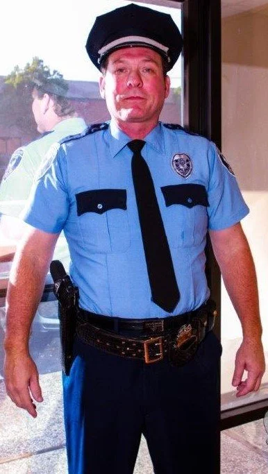 Anthony A. Snow as a Security Guard