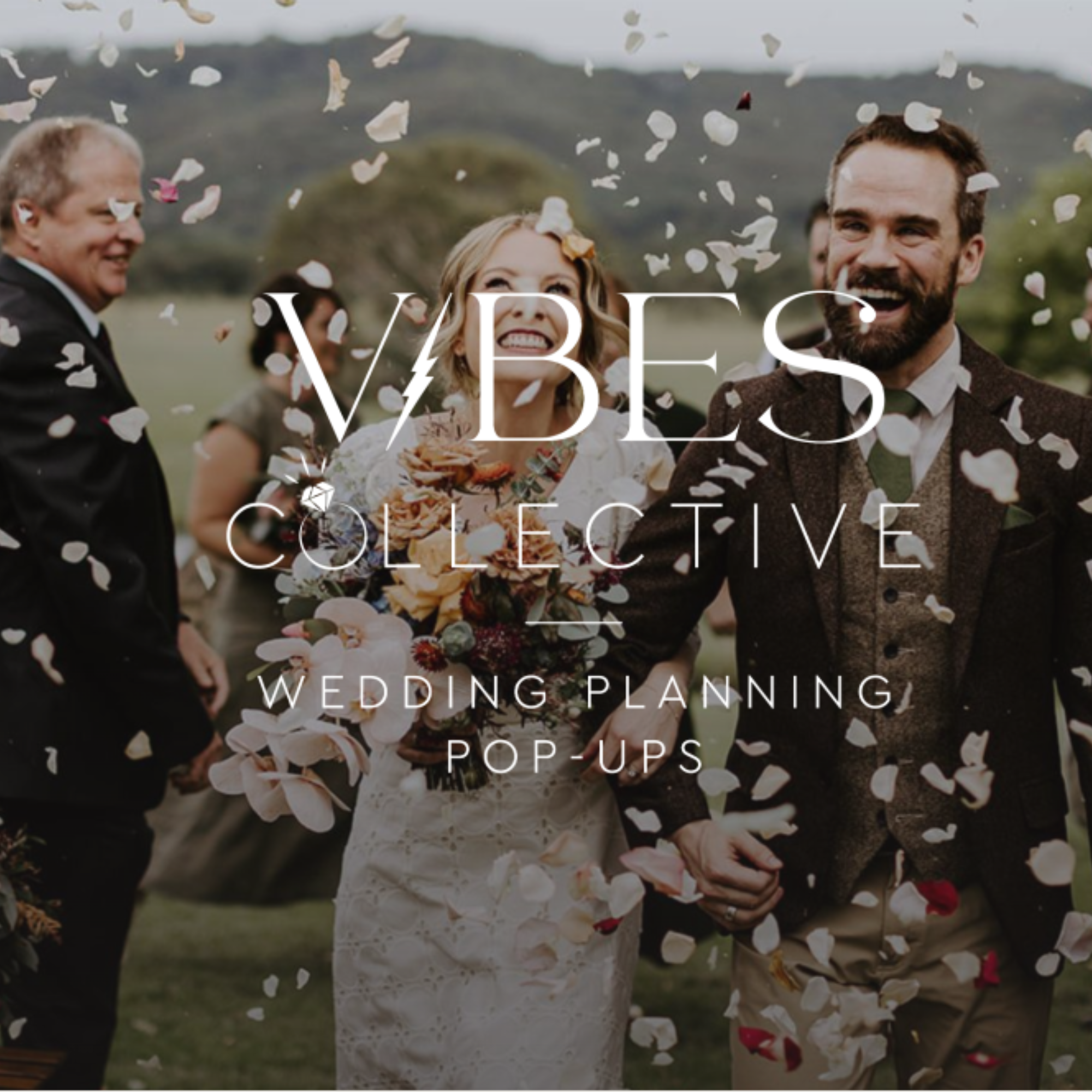 People celebrating a wedding outdoor with flower petal shower.