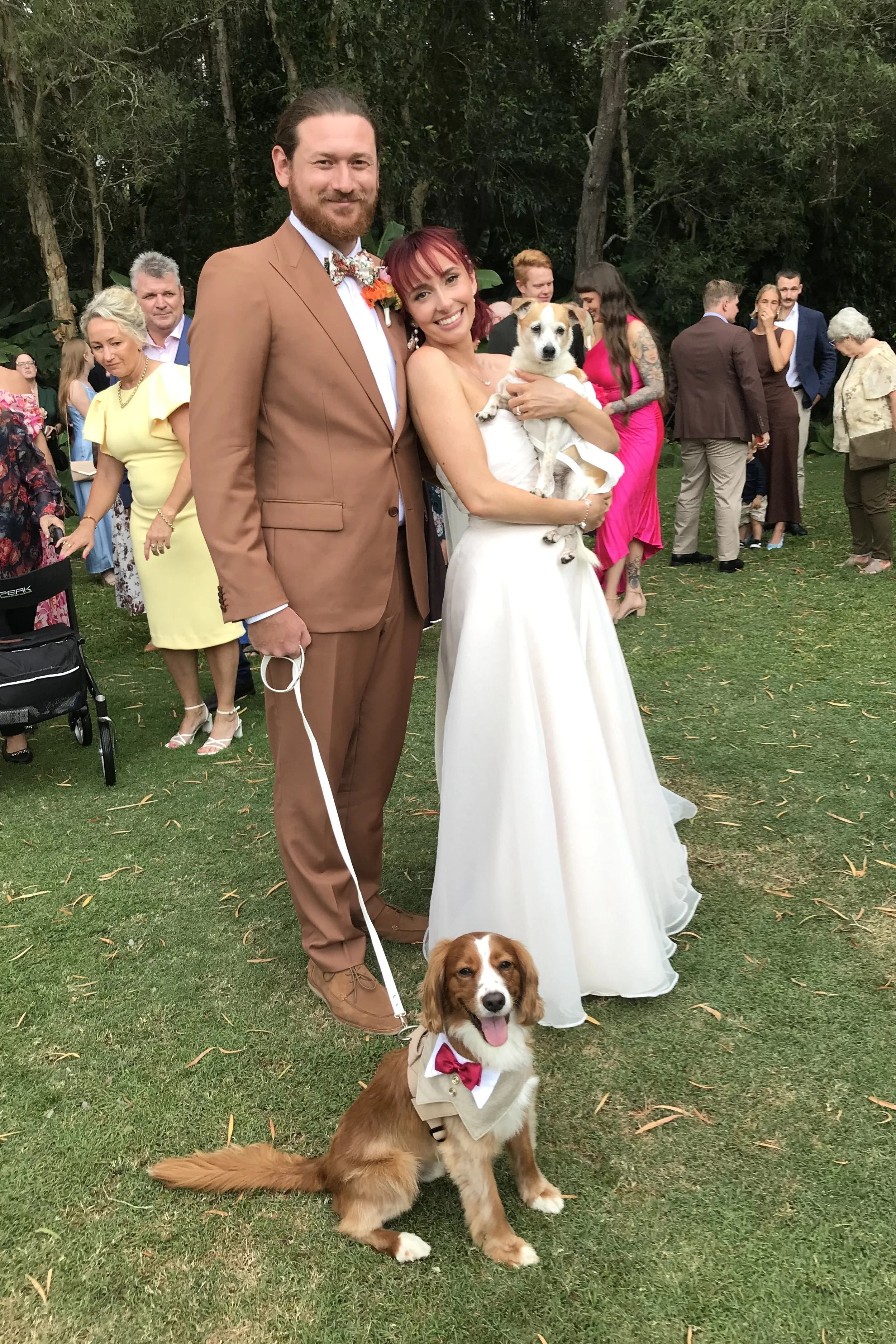 Wedding couple with their two dogs at Twin Waters Golf Club Sunshine Coast