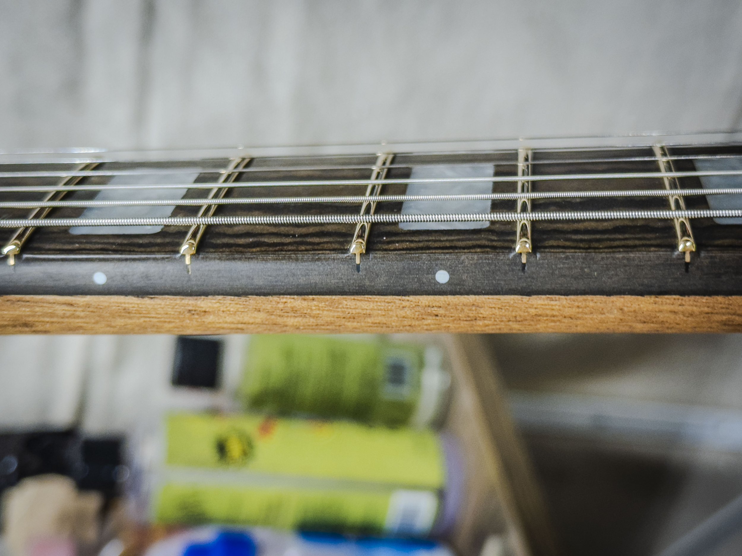 This is the fresh fret job on a Polo "Model J" made for Jeremy Plato of the band, Cross Canadian Ragweed.
.050" x .085" EVO Gold Fretwire installed over a deluxe Richlite Fretboard 