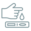 Hand with a drop of liquid above a test strip