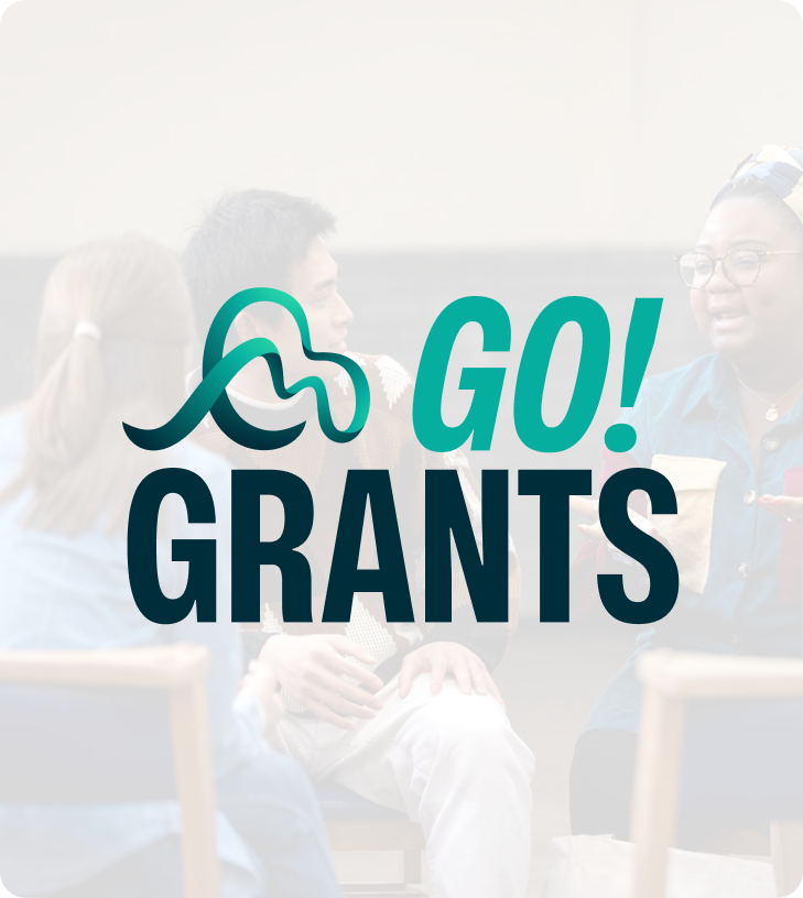 People sitting and talking, overlaid with text 'Go! Grants' and an abstract logo.