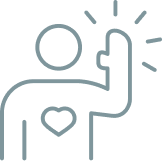 A person with a heart on their chest giving a high five.