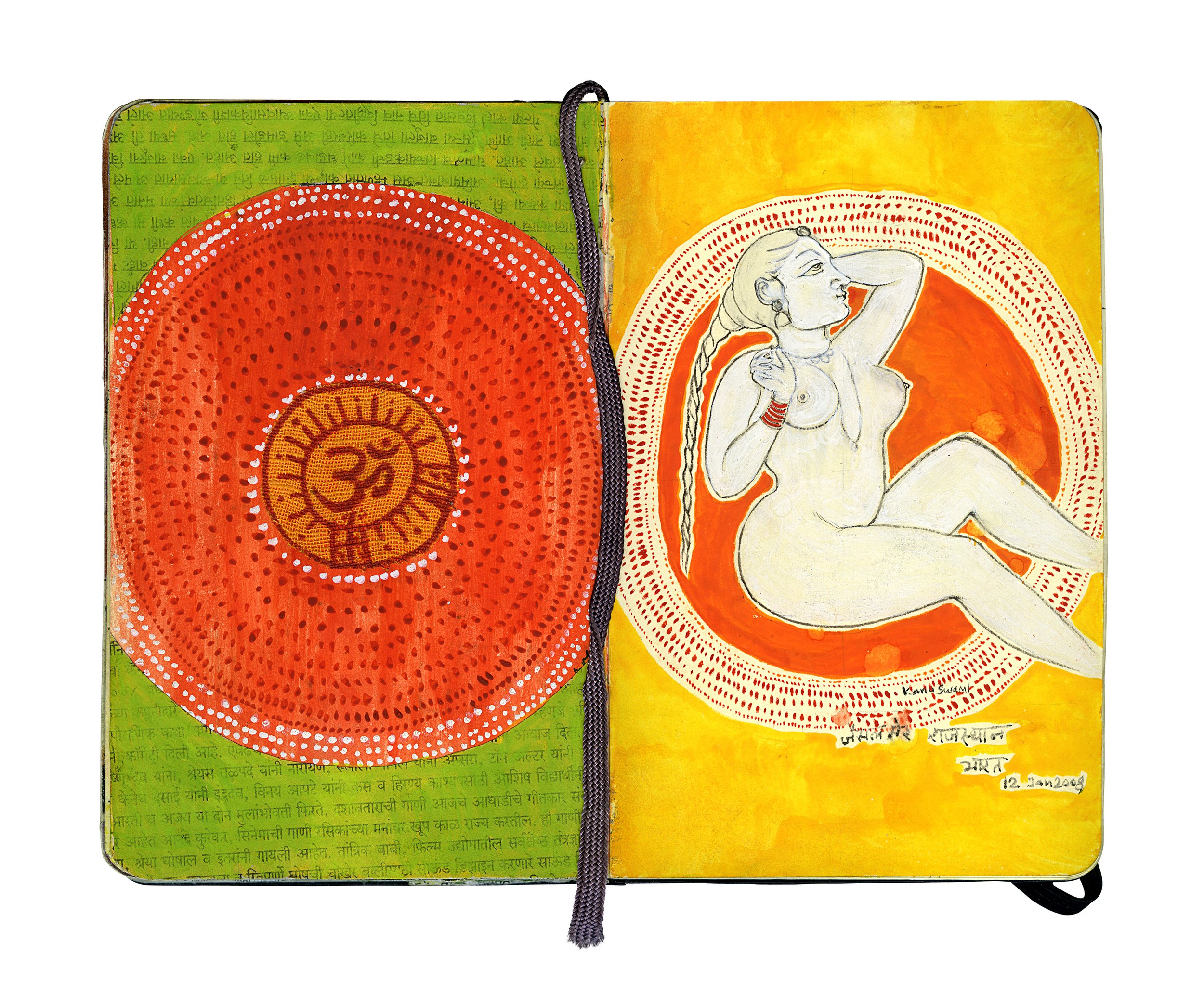 An open sketchbook with colorful artwork. The left page features a large red circle with white dots and an orange center containing a yellow Om symbol. The right page has a drawing of a woman with long braided hair, seated with one arm behind her hea