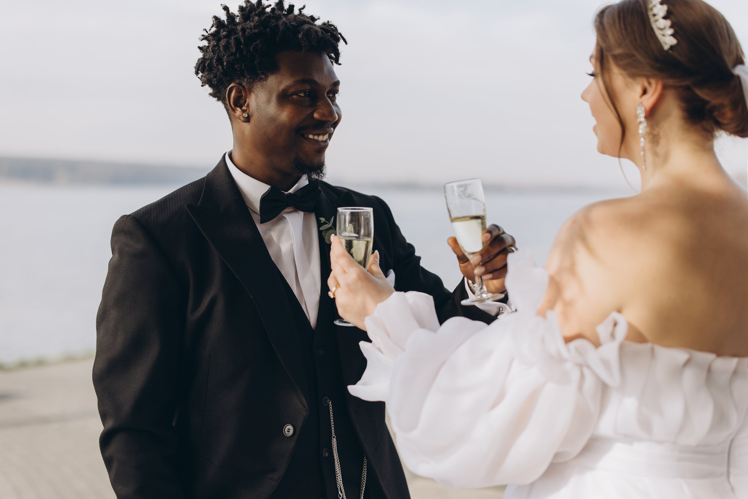 interracial-couple-toasting-with-champagne-at-wedd-2026-01-08-02-08-06-utc.jpg