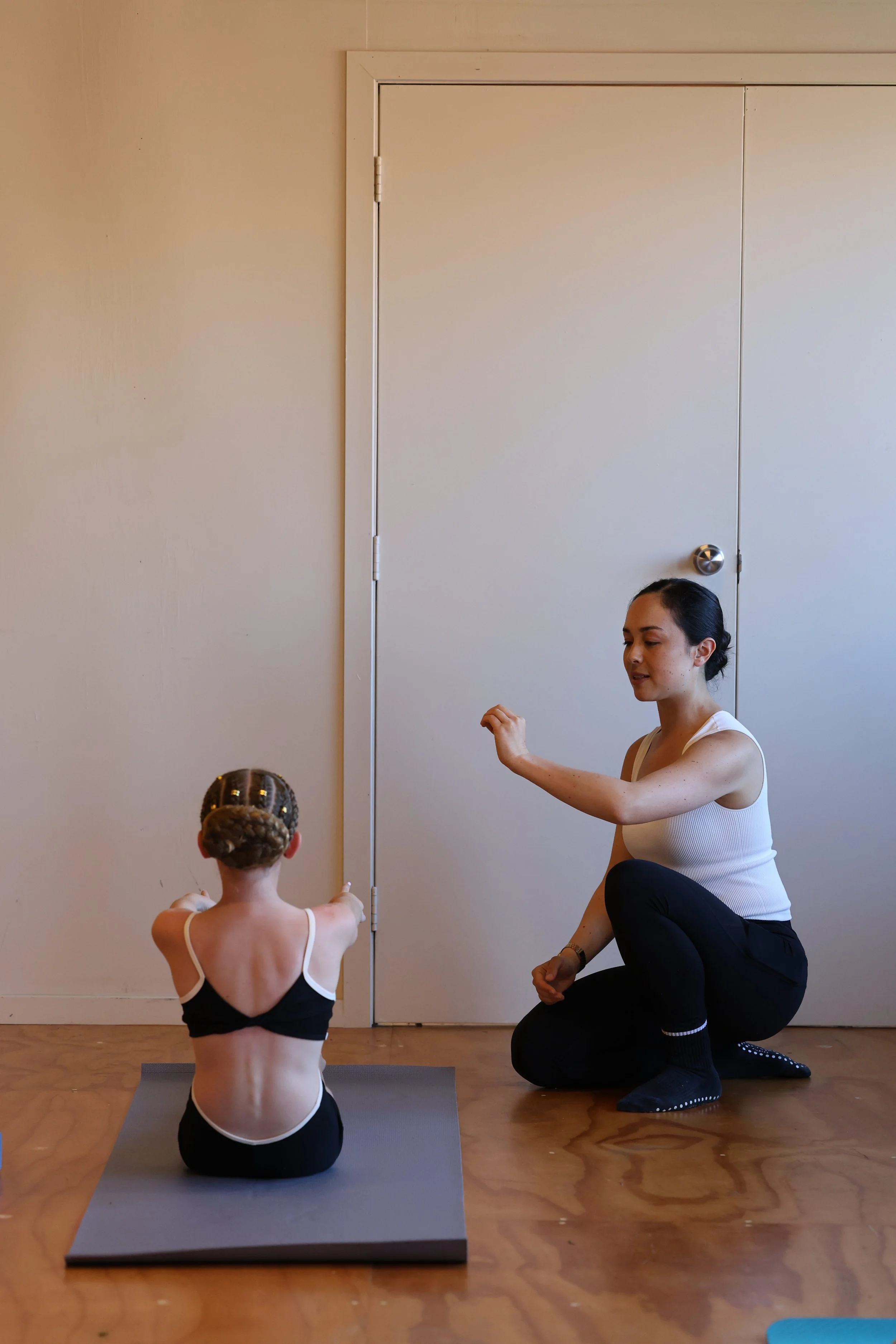 Olivia Holland coaching technical precision in an Auckland dance workshop