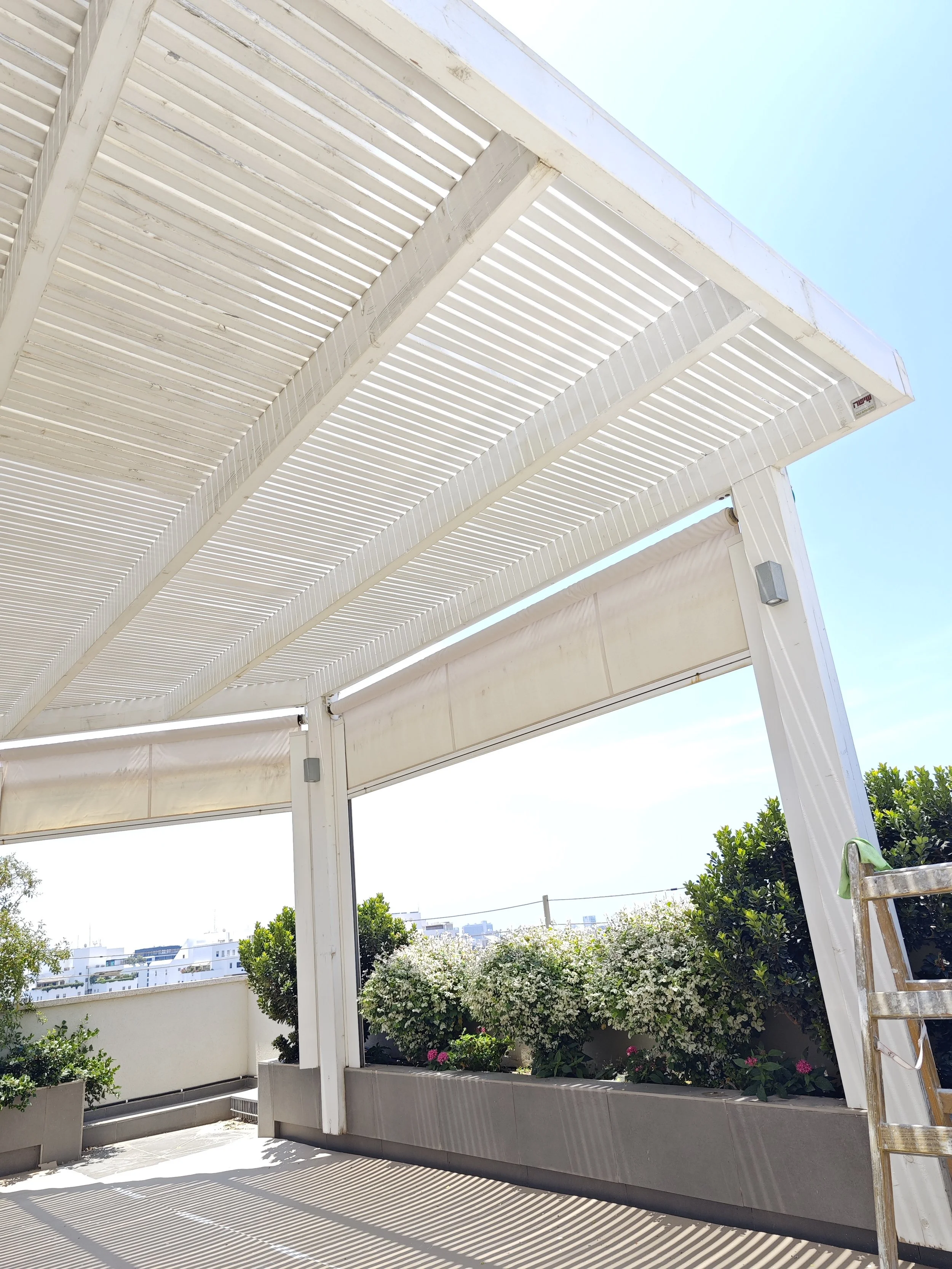 Pergola painting and exterior wood finishing completed for a residential project in Halifa