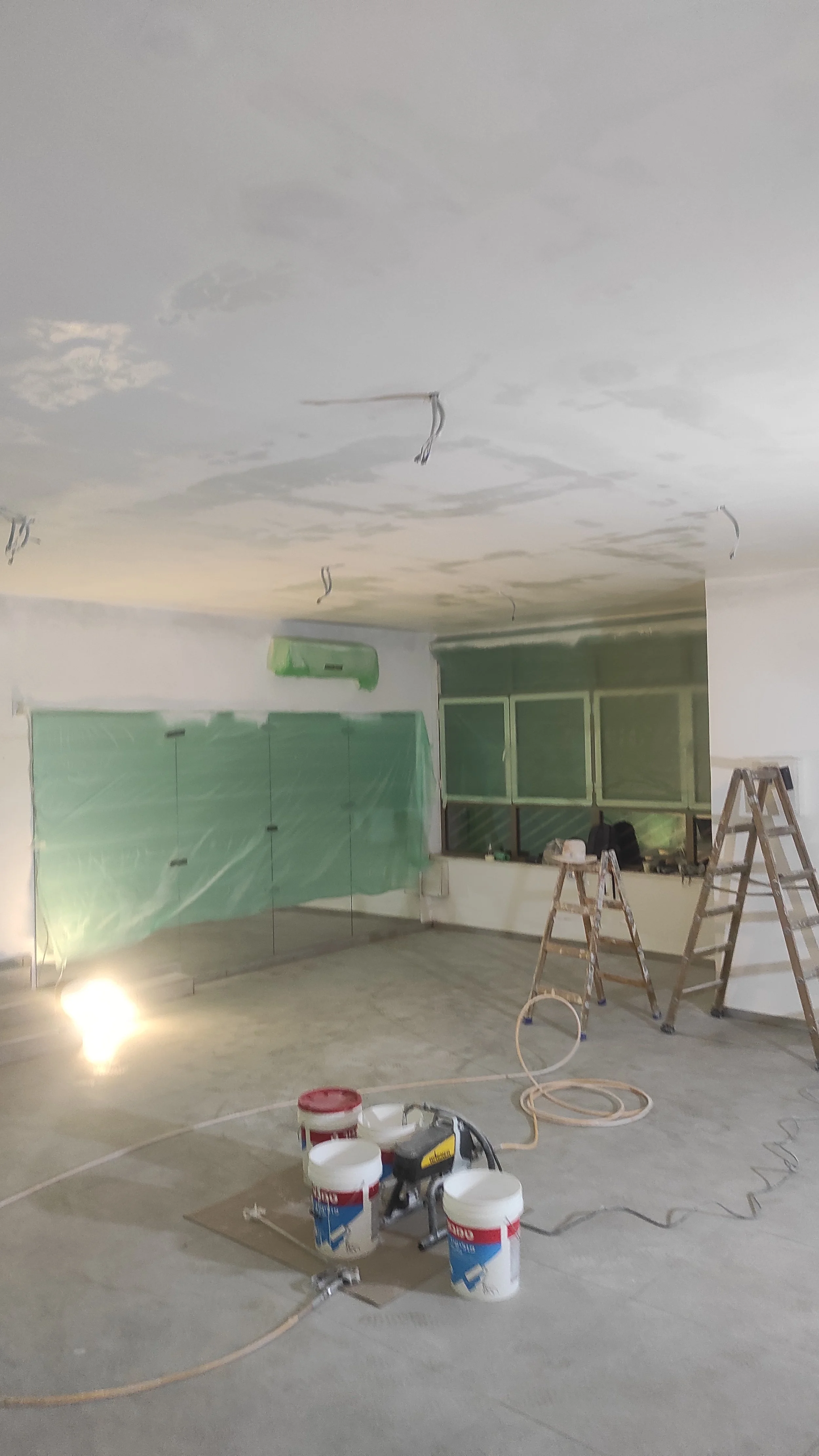 Ceiling painting using airless spray for a commercial project in Halifax