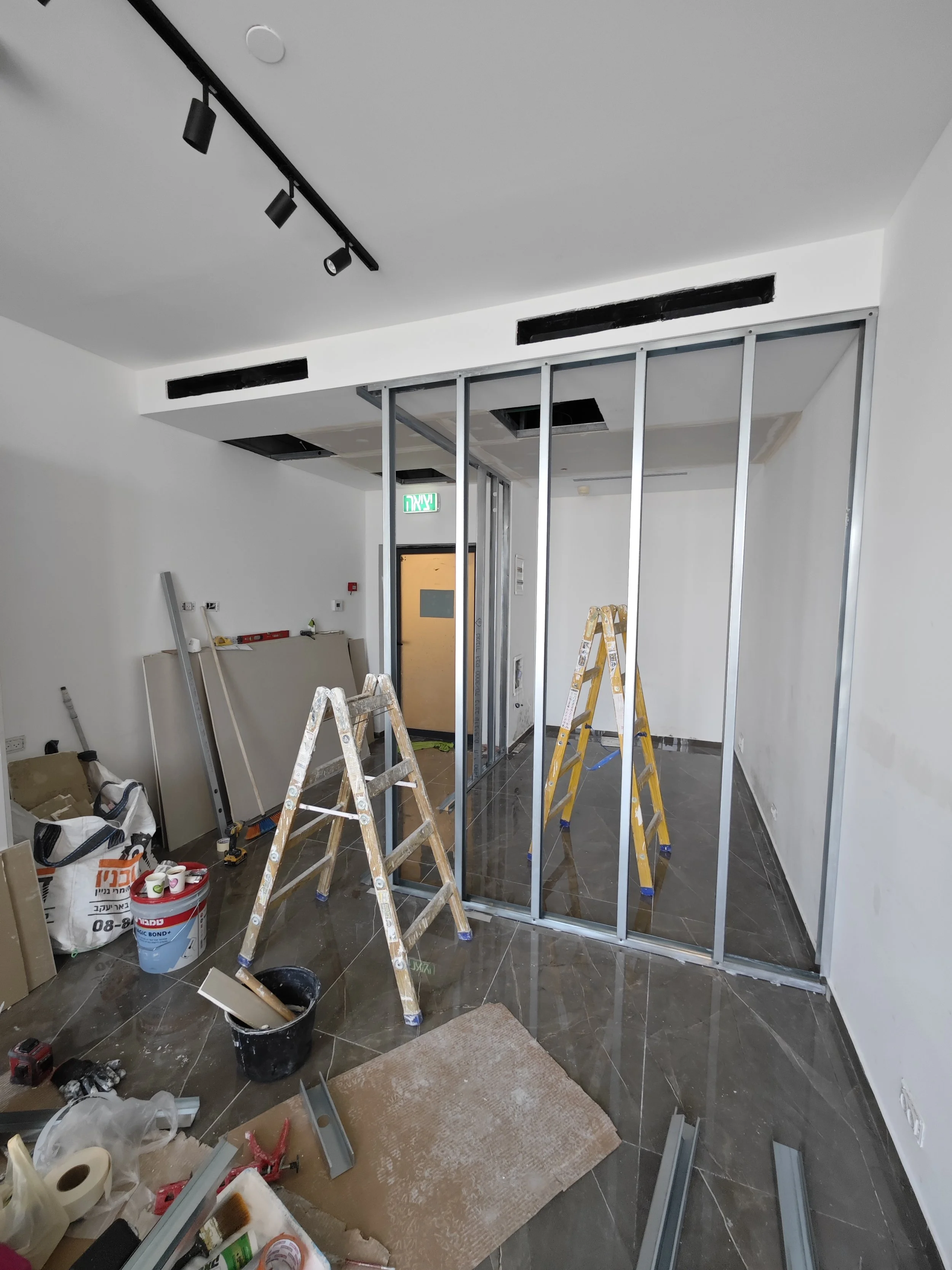 New office layout framing and drywall installation for a commercial project in Spryfield