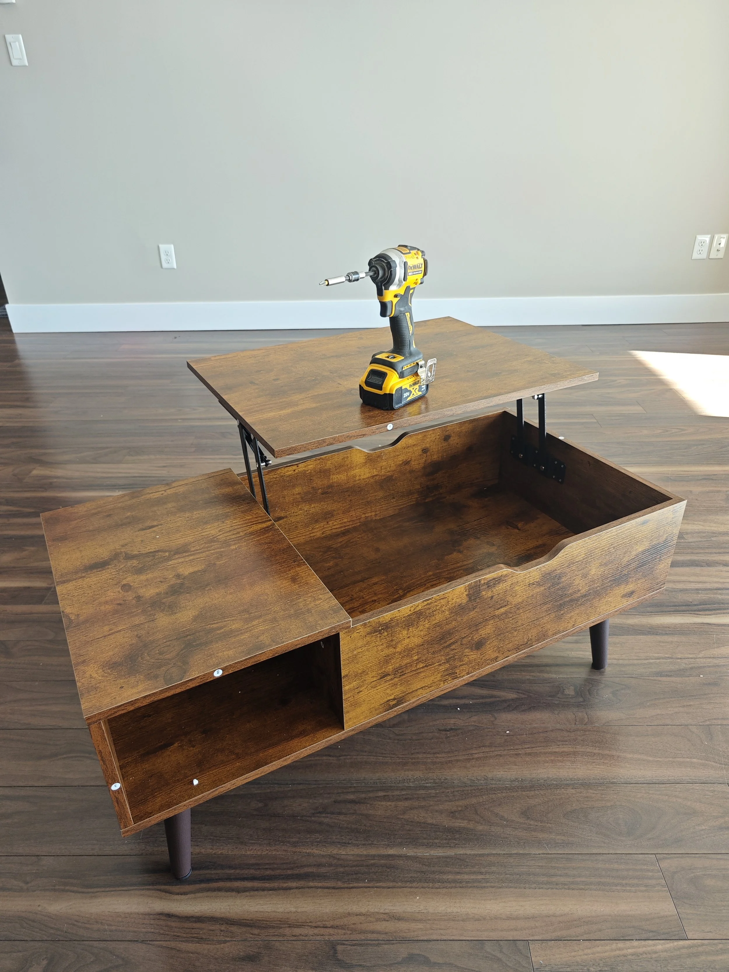 Furniture assembly in progress for a coffee table installation in Lower Sackville