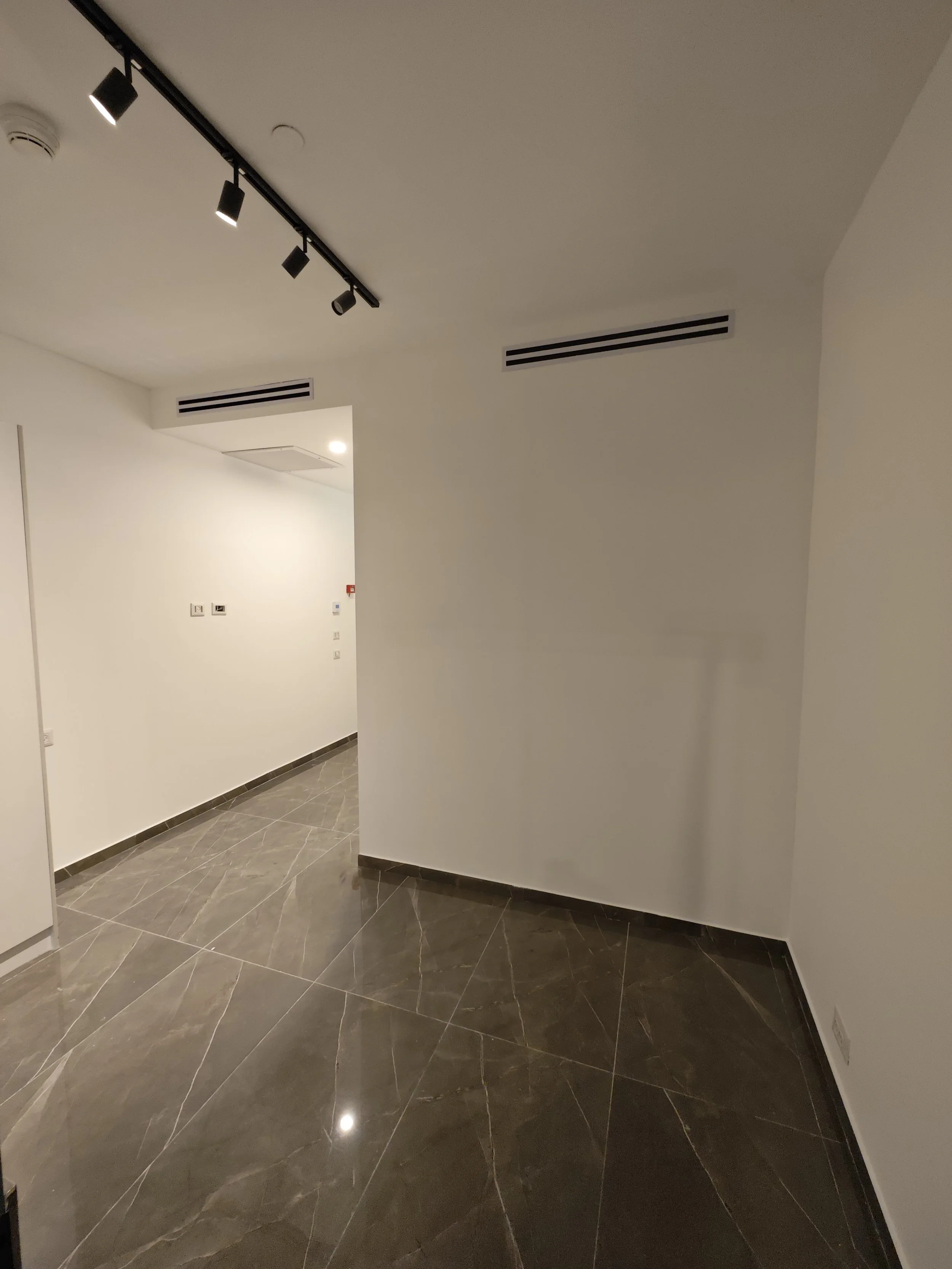 Office repainting completed with clean, professional finish for a commercial space in Halifax
