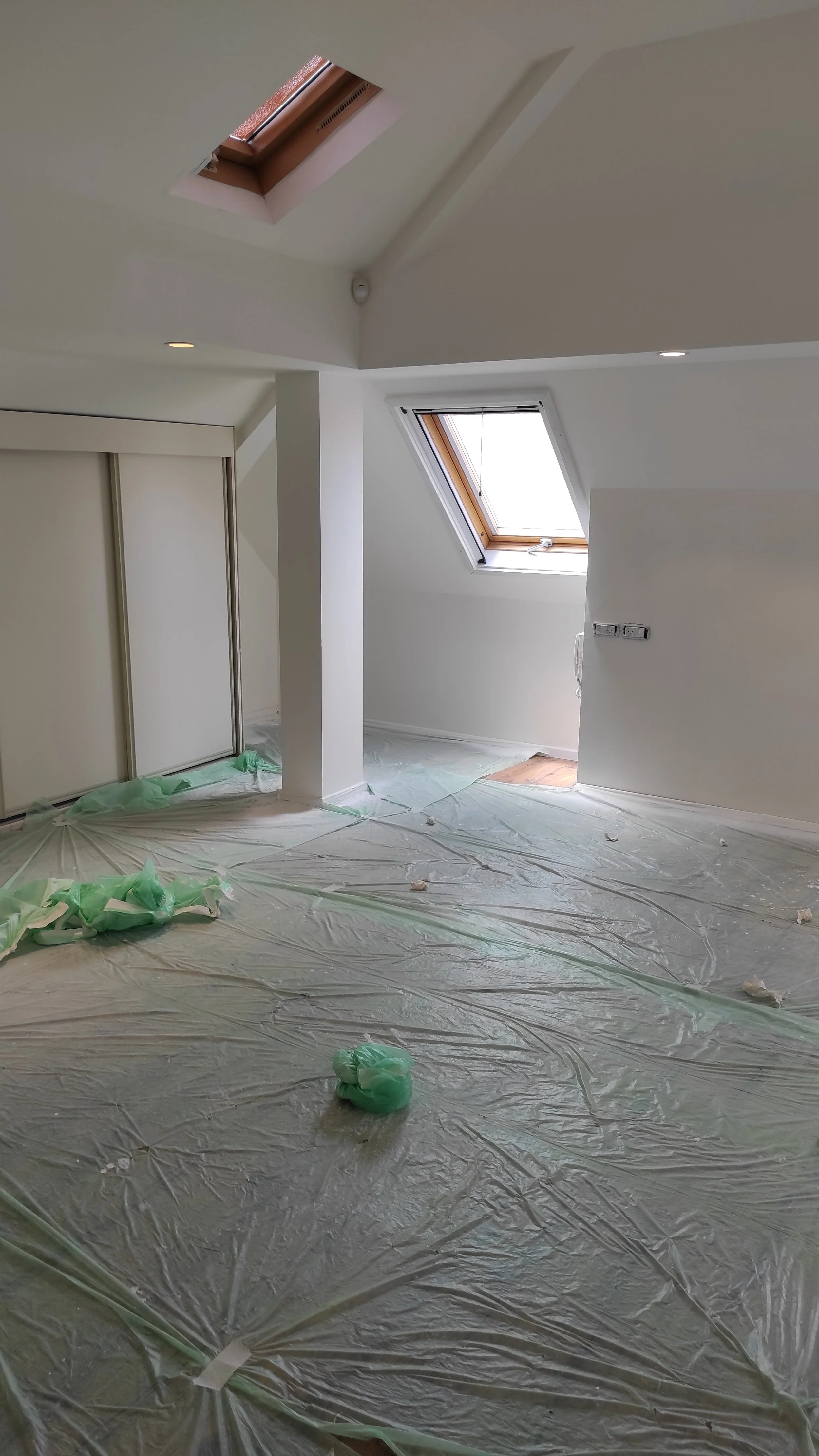 Interior painting preparation with full floor and surface protection for a residential project in Halifax
