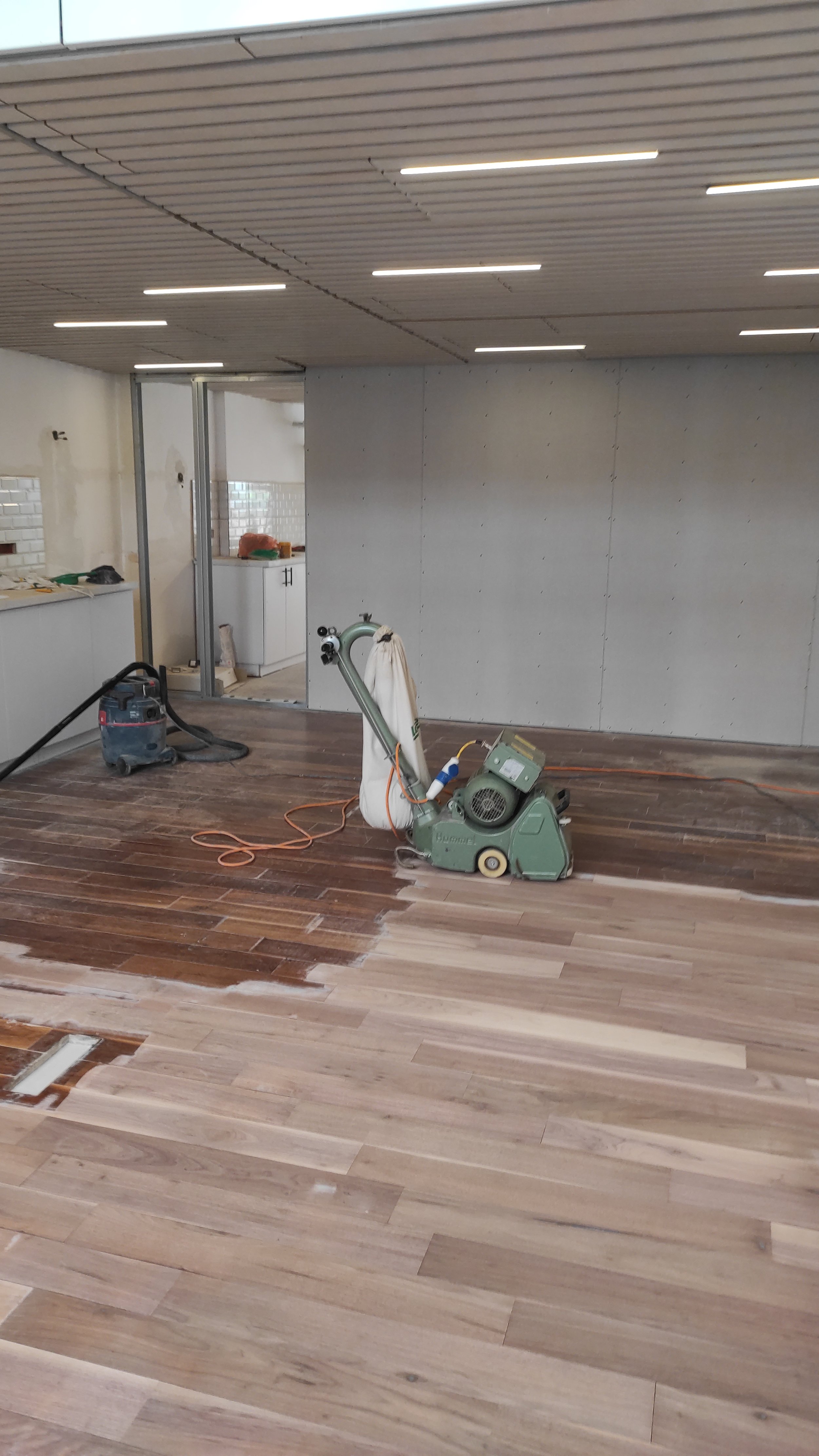 Removing top layer of parquet, applying new varnish