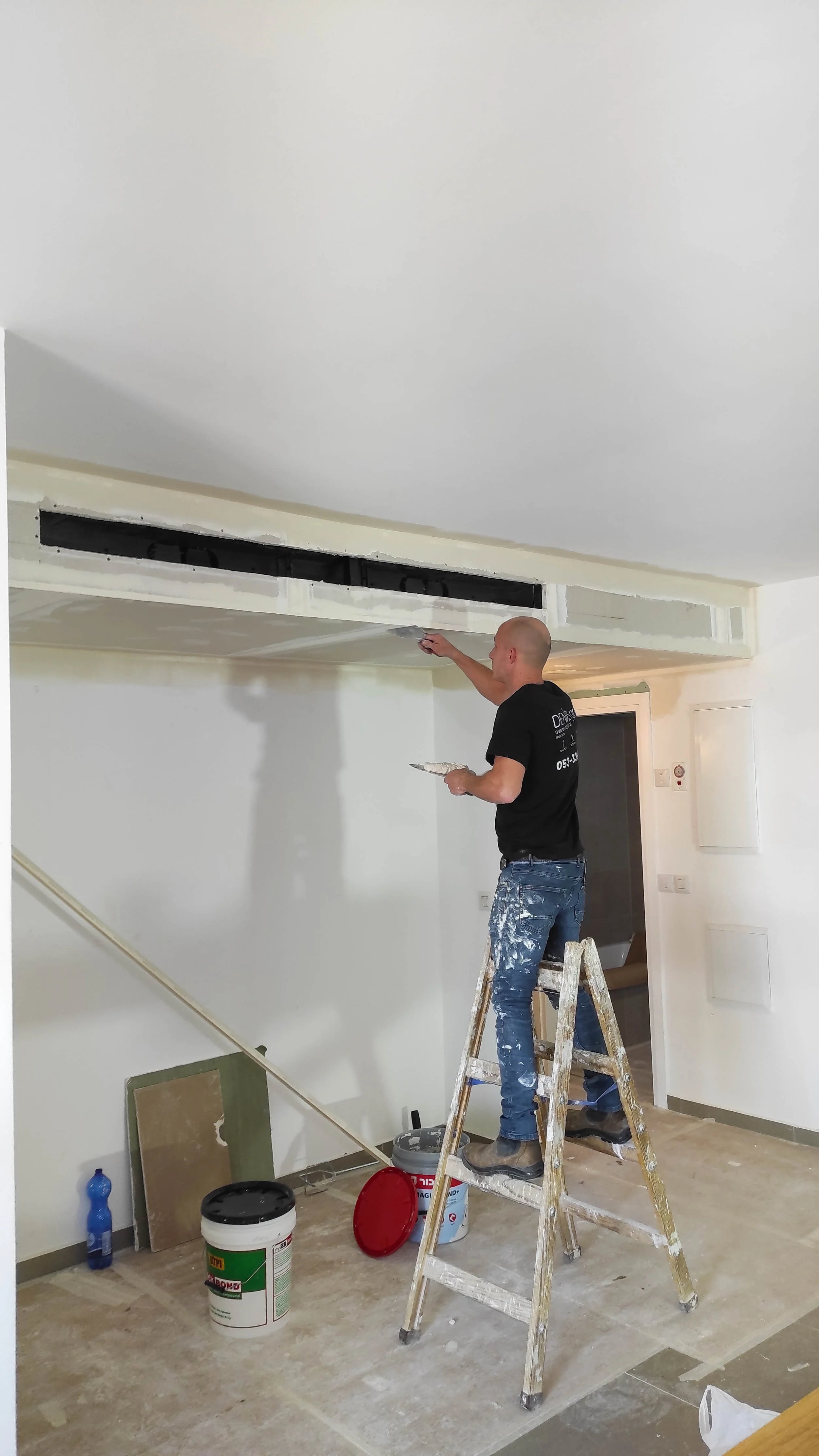 Drywall installation and finishing around HVAC system for a residential project in Fall River