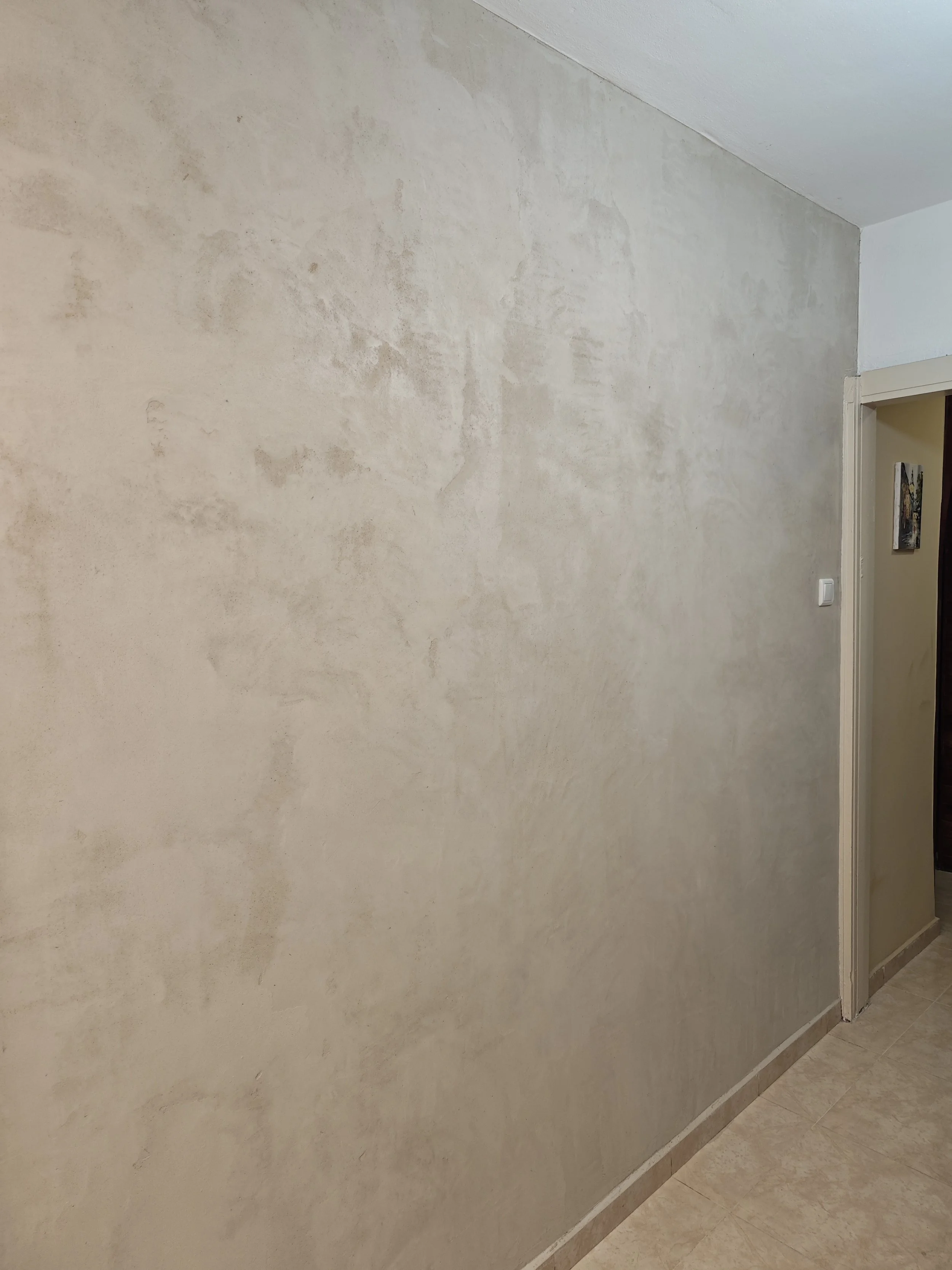Decorative stucco-style wall finish applied for interior space in Halifax