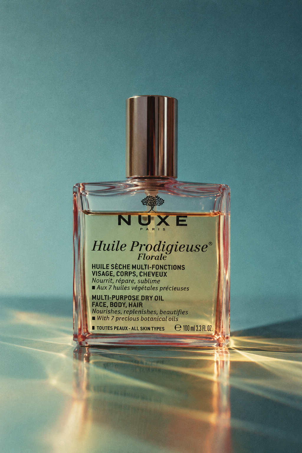 NUXE Floral Oil in Teal Light.png