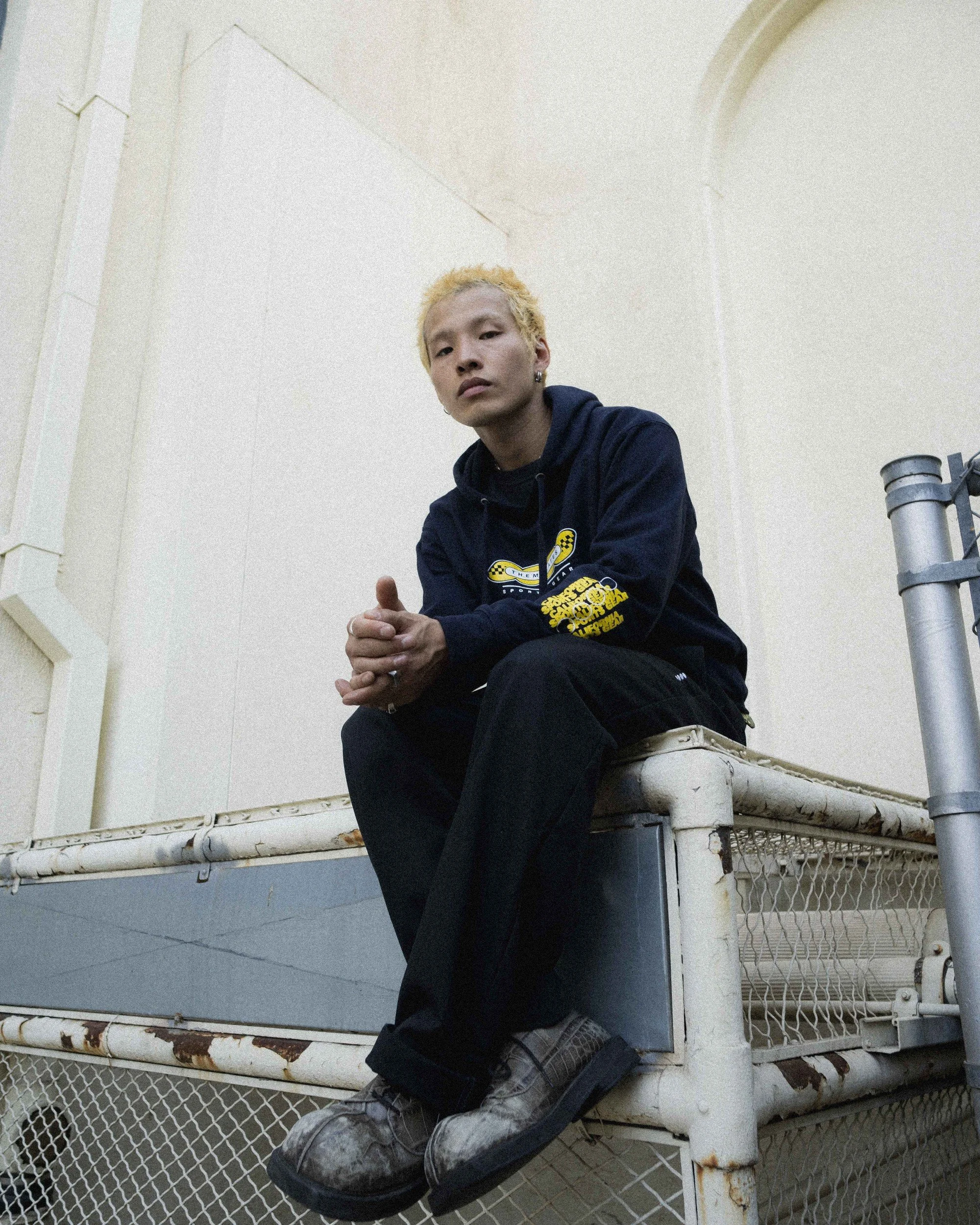 21-navy-hoodie-seated.jpg