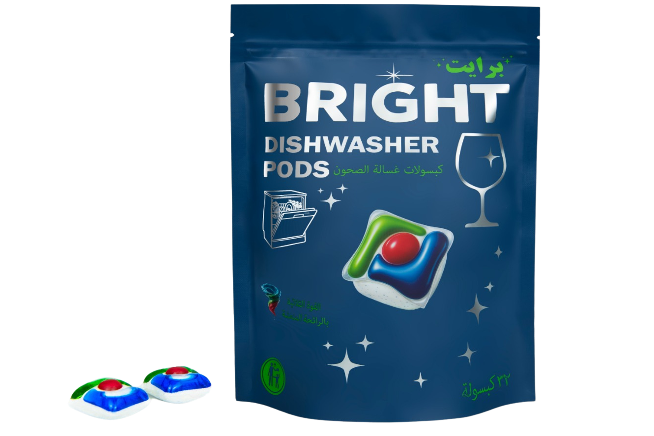 A blue package of Bright dishwasher pods with colorful cleaning gel capsules inside, featuring Arabic text and a glass icon.