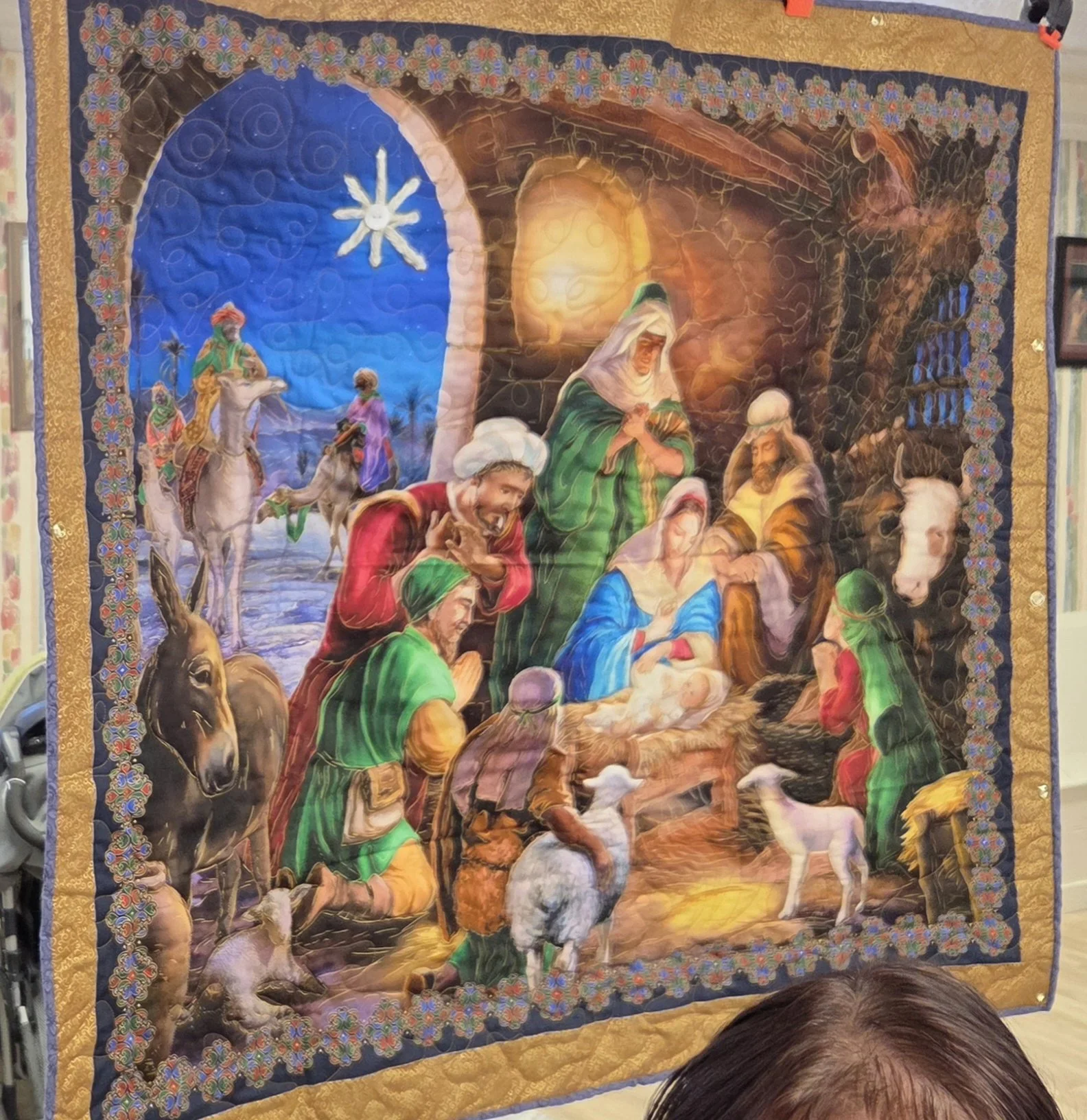 Wall hanging quilted by church member Diane Chasse and machine quilted by Father Gary. Hung in the church for our Christmas celebration of the birth of Jesus.