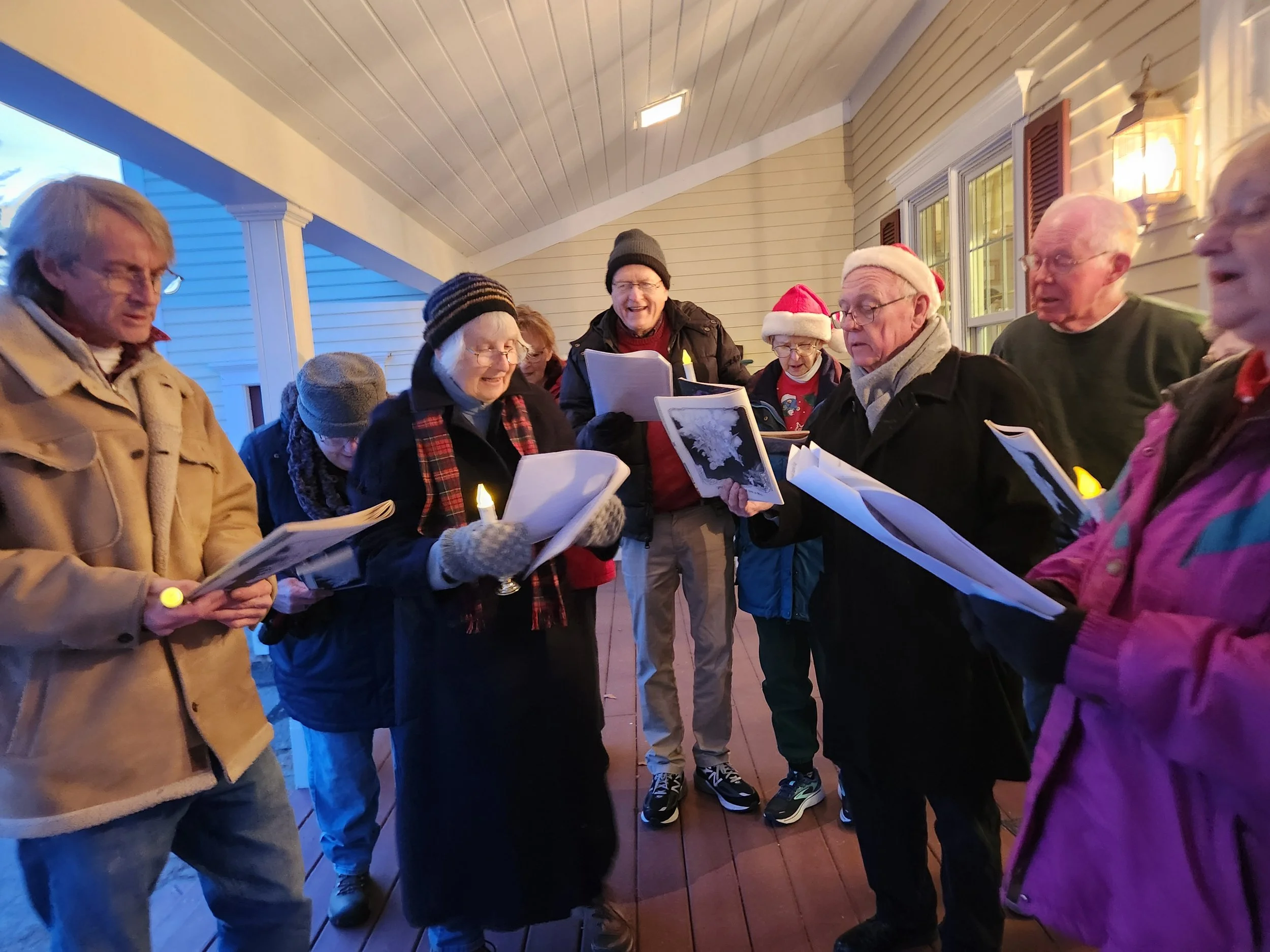 Christmas caroling in 2024 (Peter, Nancy, Harriet, Steve, Betsy, Father Gary, Jim, and Diane Drinkwater)
