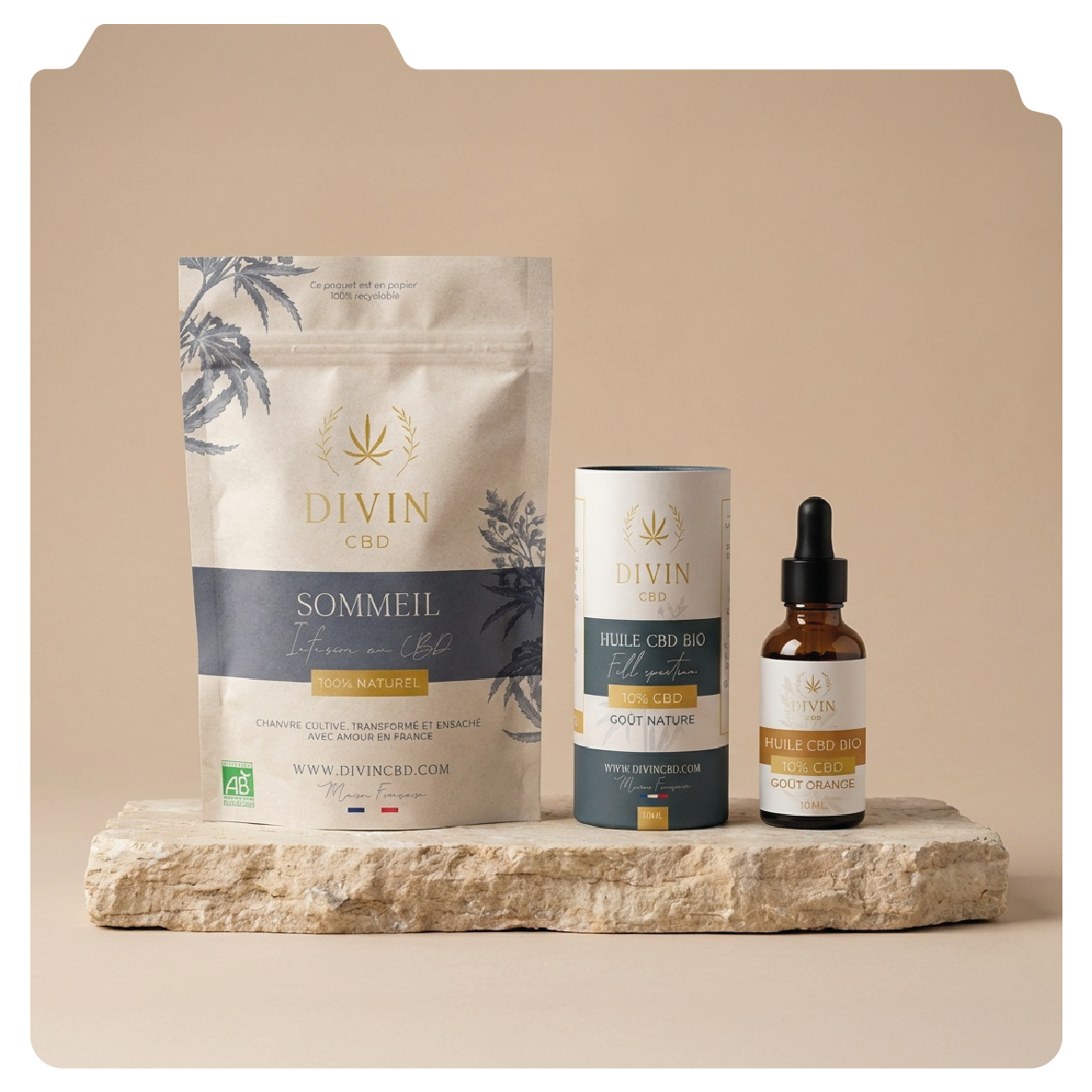 Design graphique de packaging de Trois produits CBD de la marque Divin, comprenant un sachet, une boîte et une fiole avec un compte-gouttes, tous placés sur une plaque de pierre contre un fond beige.