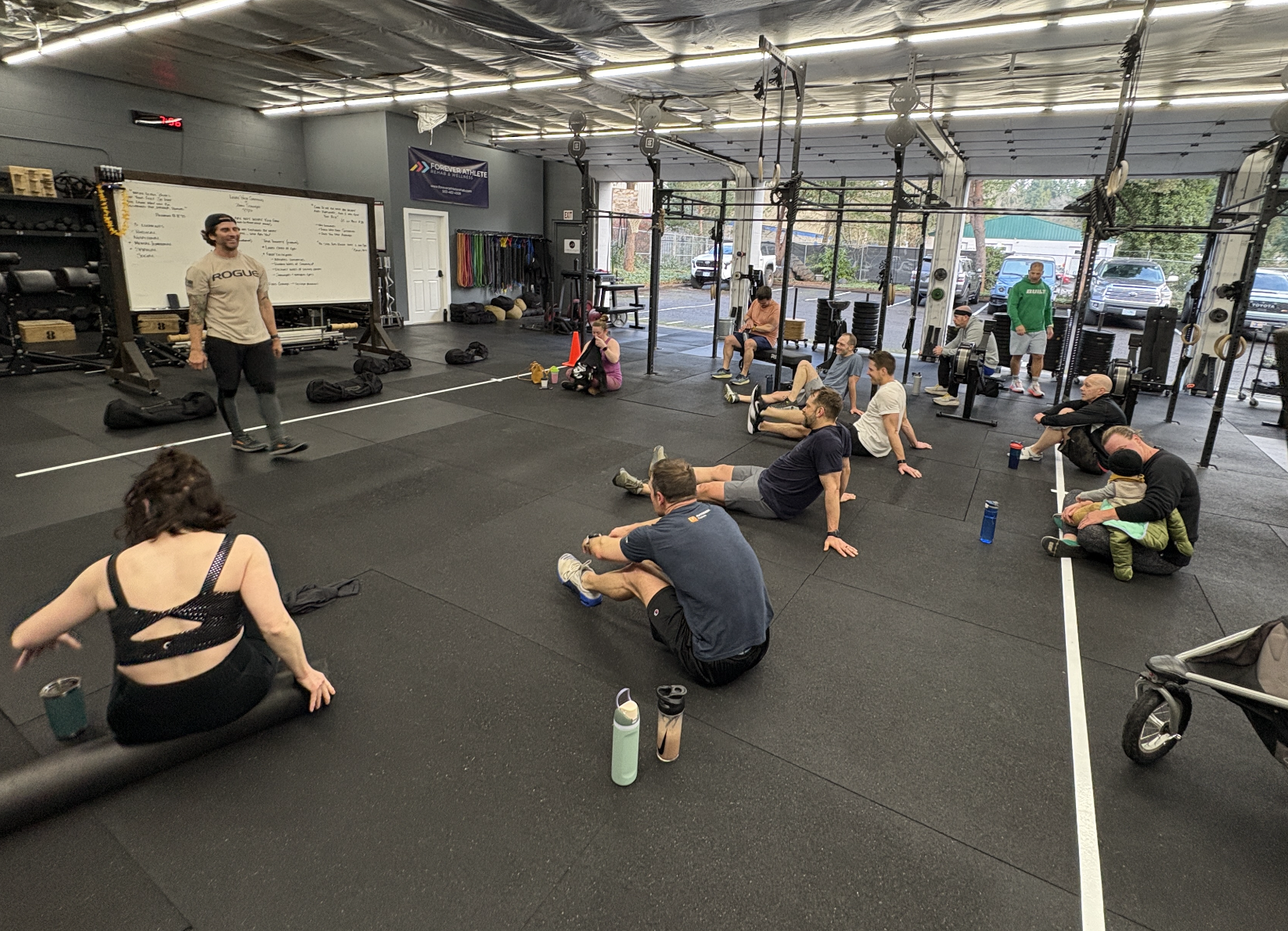 Athletes listening to a speaker