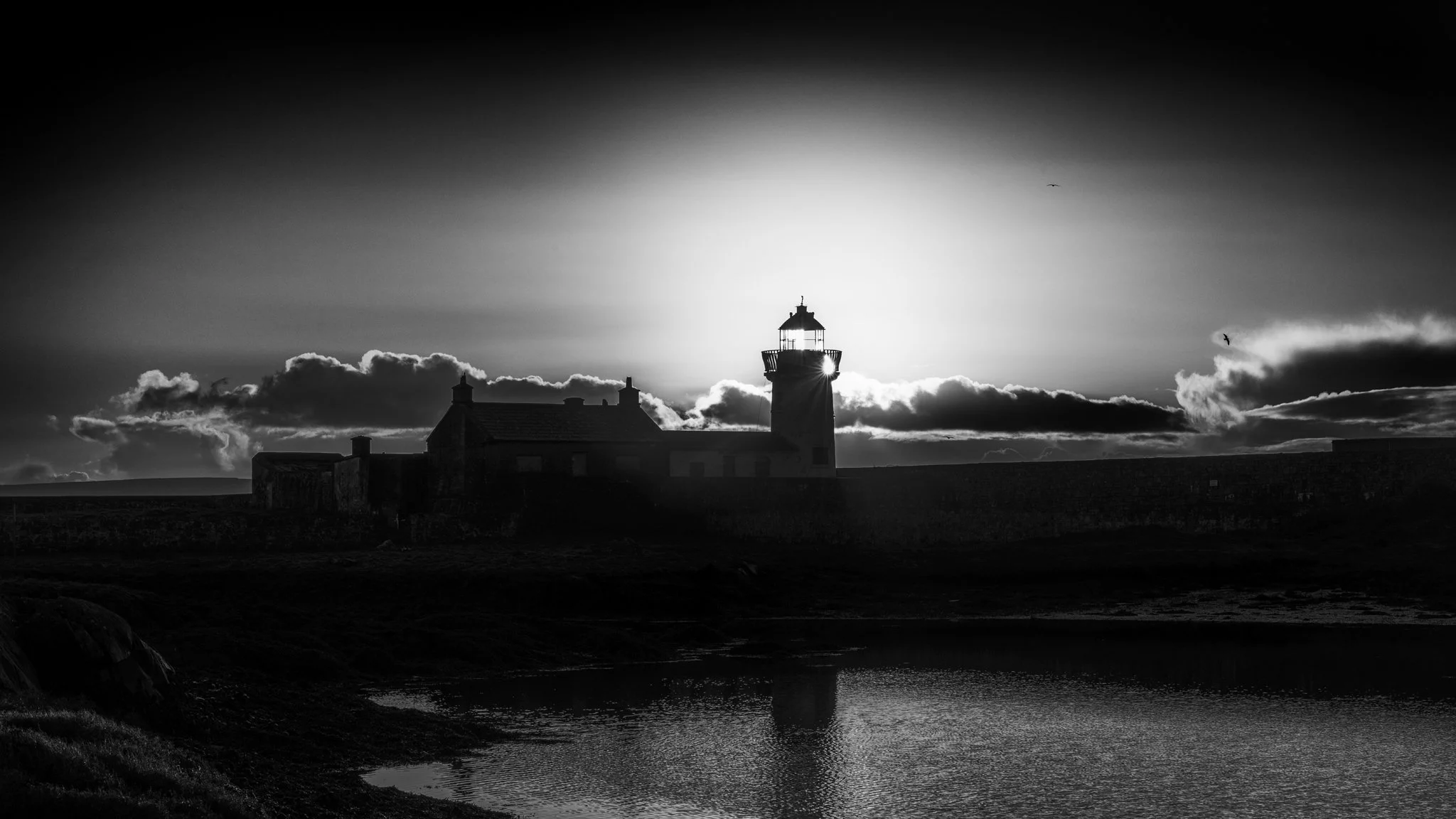 Sun Setting Over Mutton Island Lighthouse