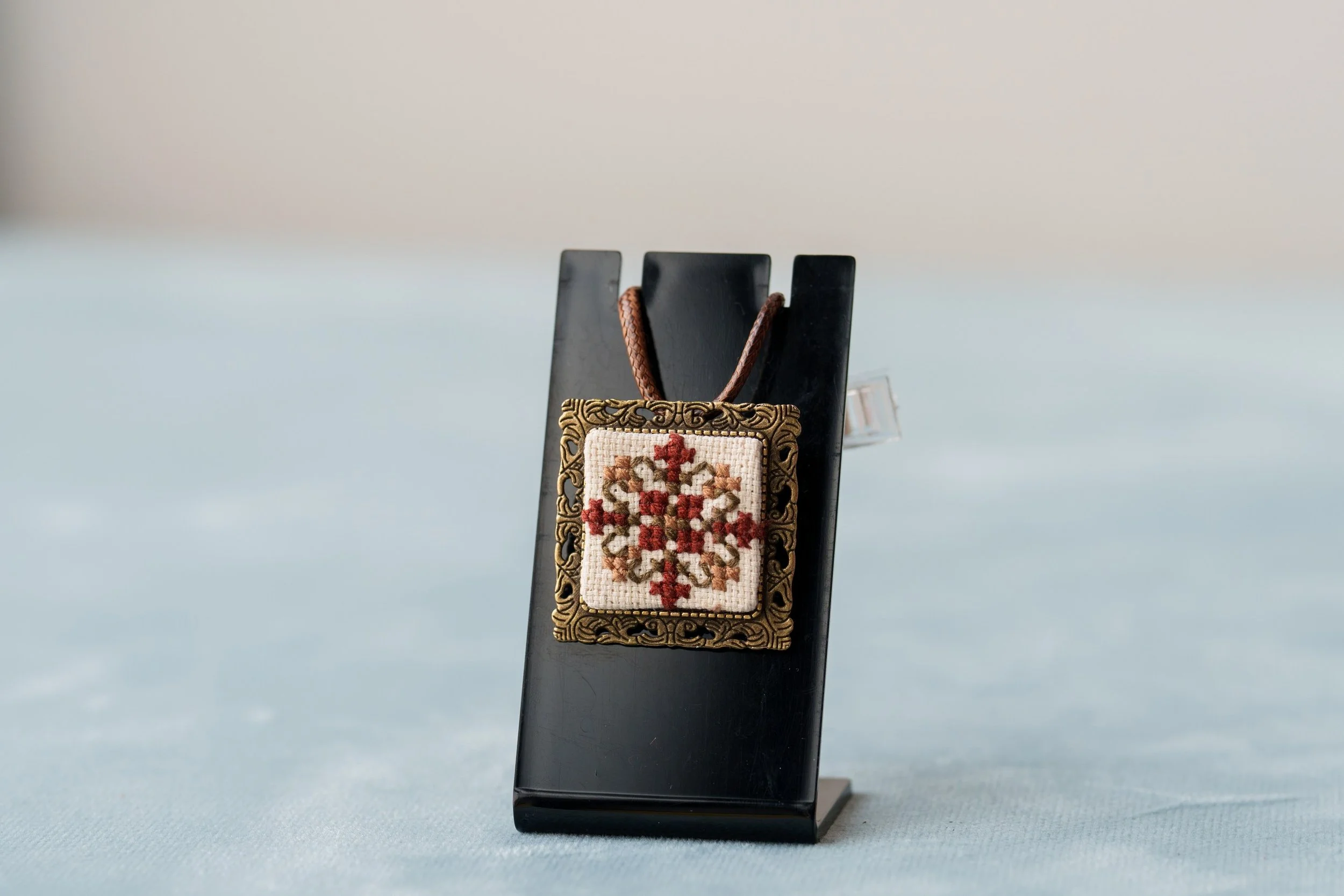 Square embroidered necklace.jpg